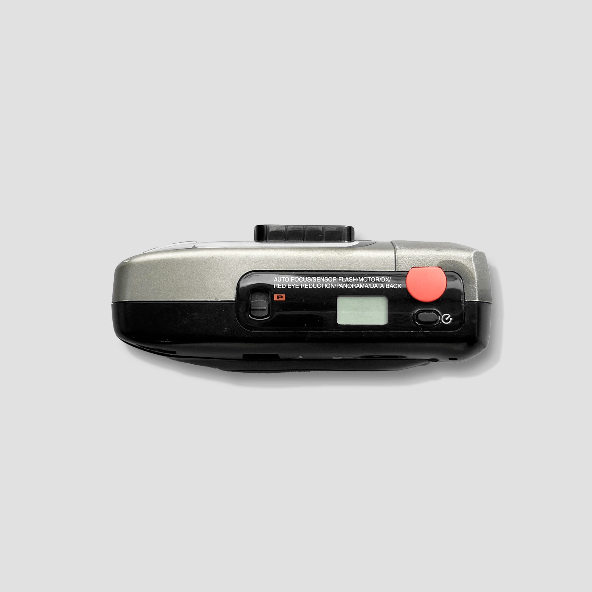 Side view of the Agfa Liva AF displaying a colorful slideshow of travel memories.