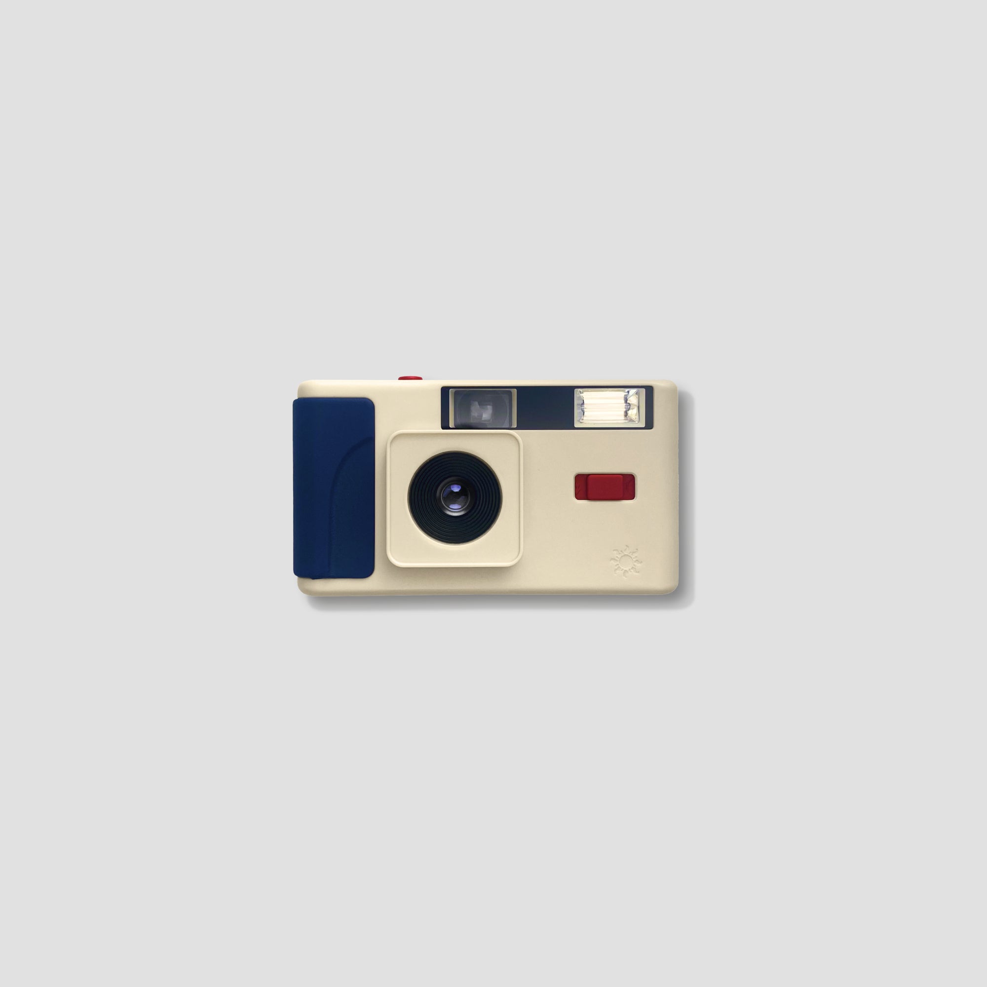 Close-up of the Long Weekend 35mm film camera highlighting its focus-free lens and manual wind feature
