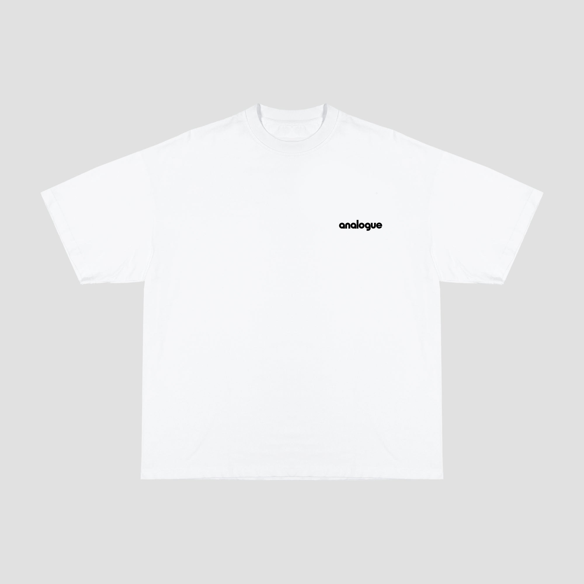 Close-up of Analogue logo on cotton shirt, highlighting quality and design.