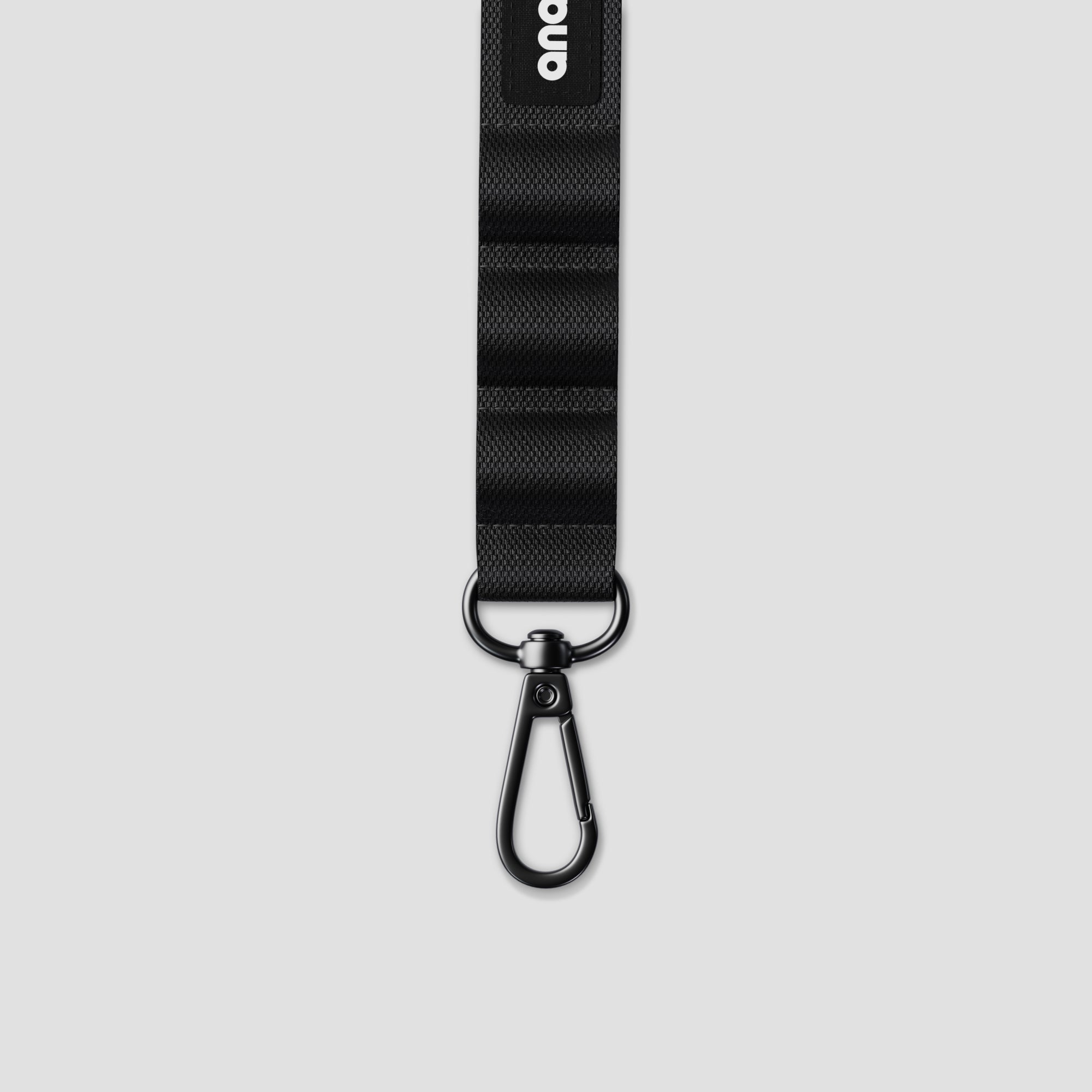 Close-up of the alloy hook and nylon strap, highlighting the durable build of this camera sling