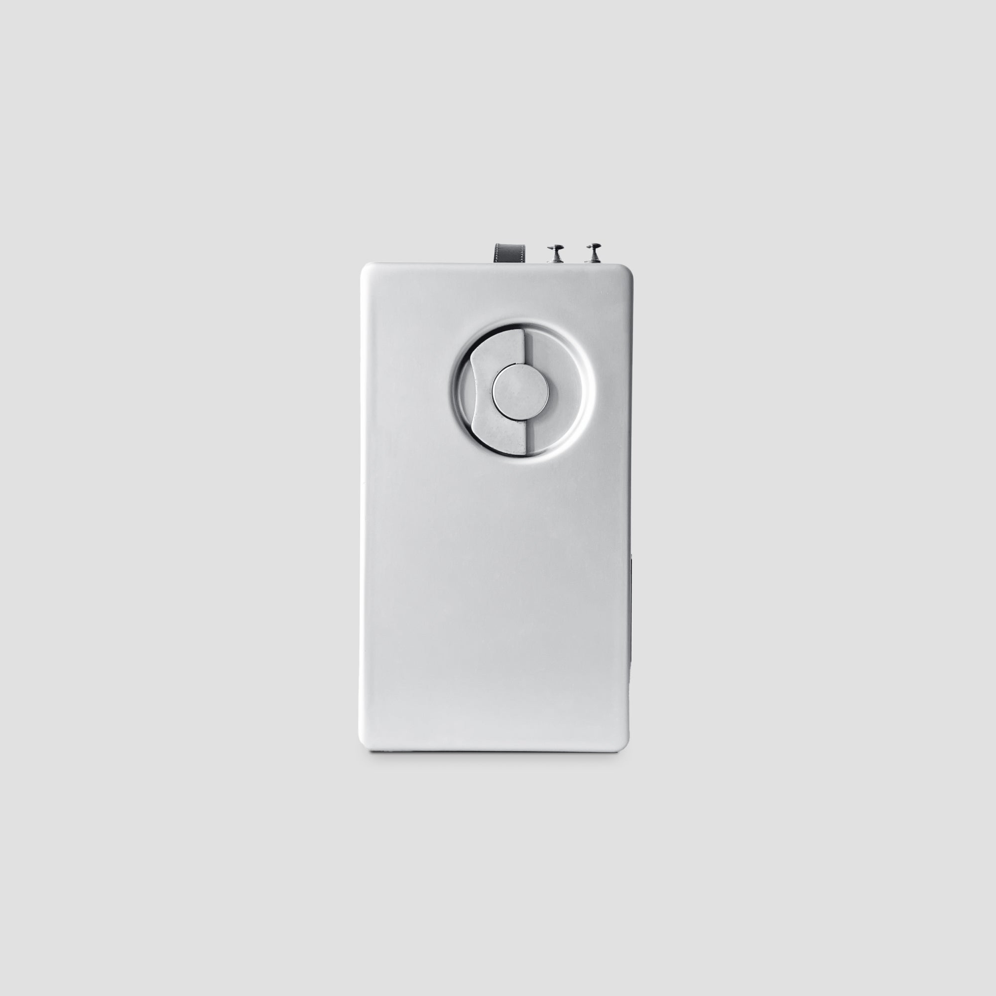Side view of the Braun T1000 CD radio highlighting the restored aluminum finish.