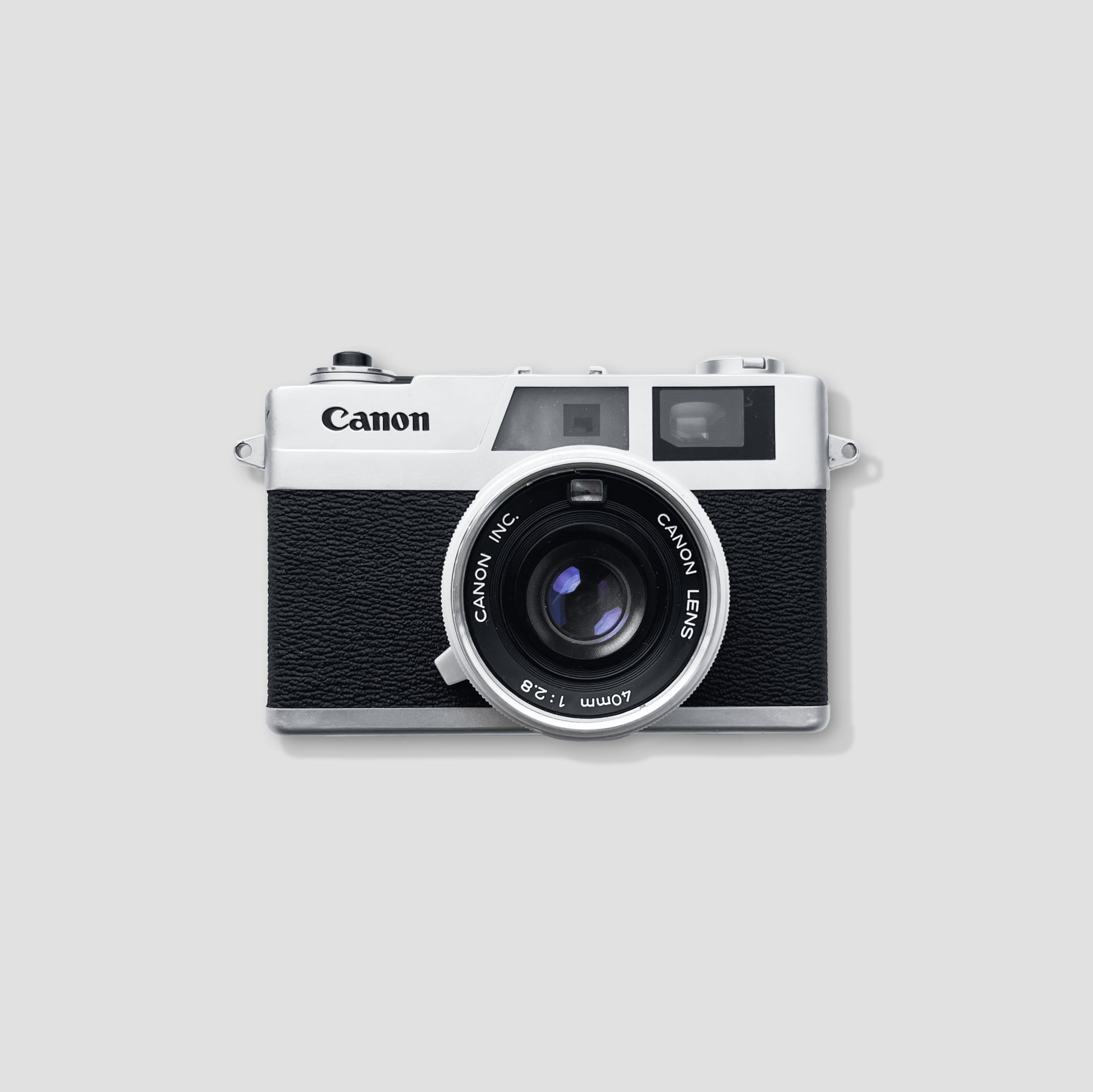 Front view of Canonet 28 rangefinder camera with lens.