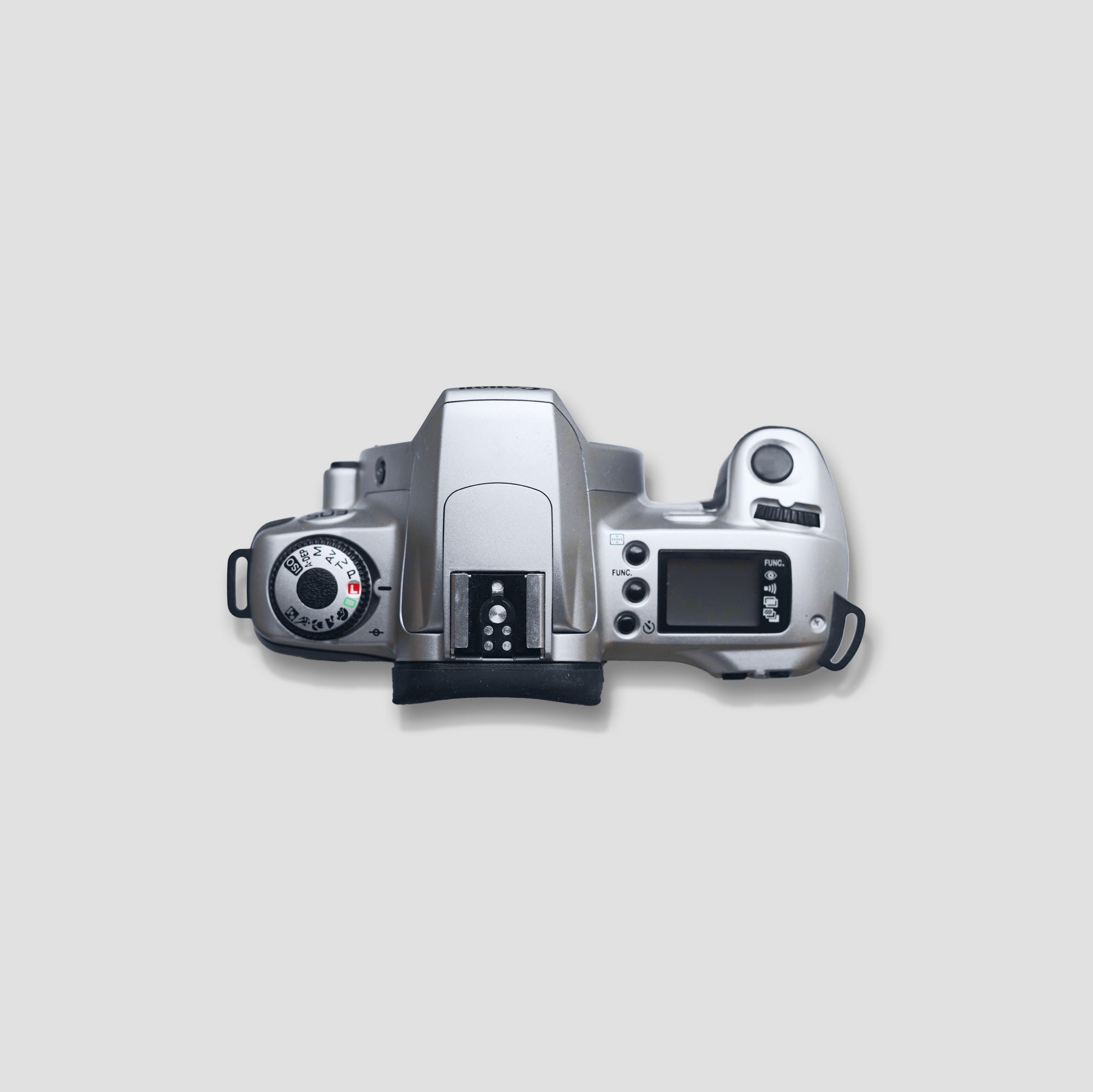 Canon EOS 3000N in action, capturing a beautiful landscape shot.