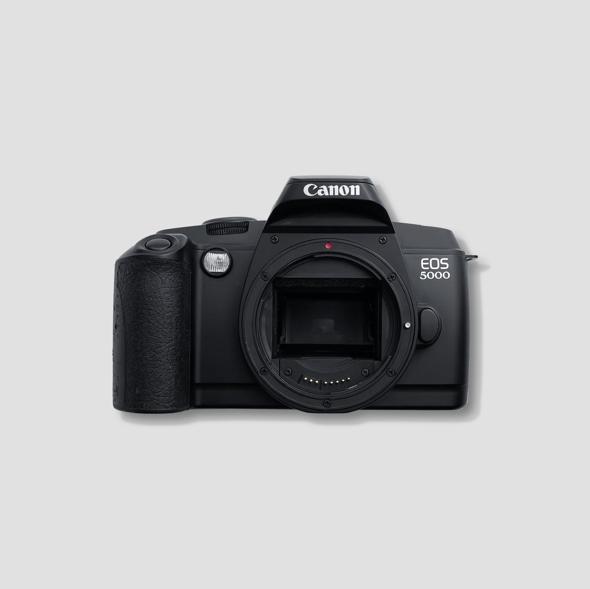 Canon EOS 5000 camera angled view, highlighting its lens and autofocus features.