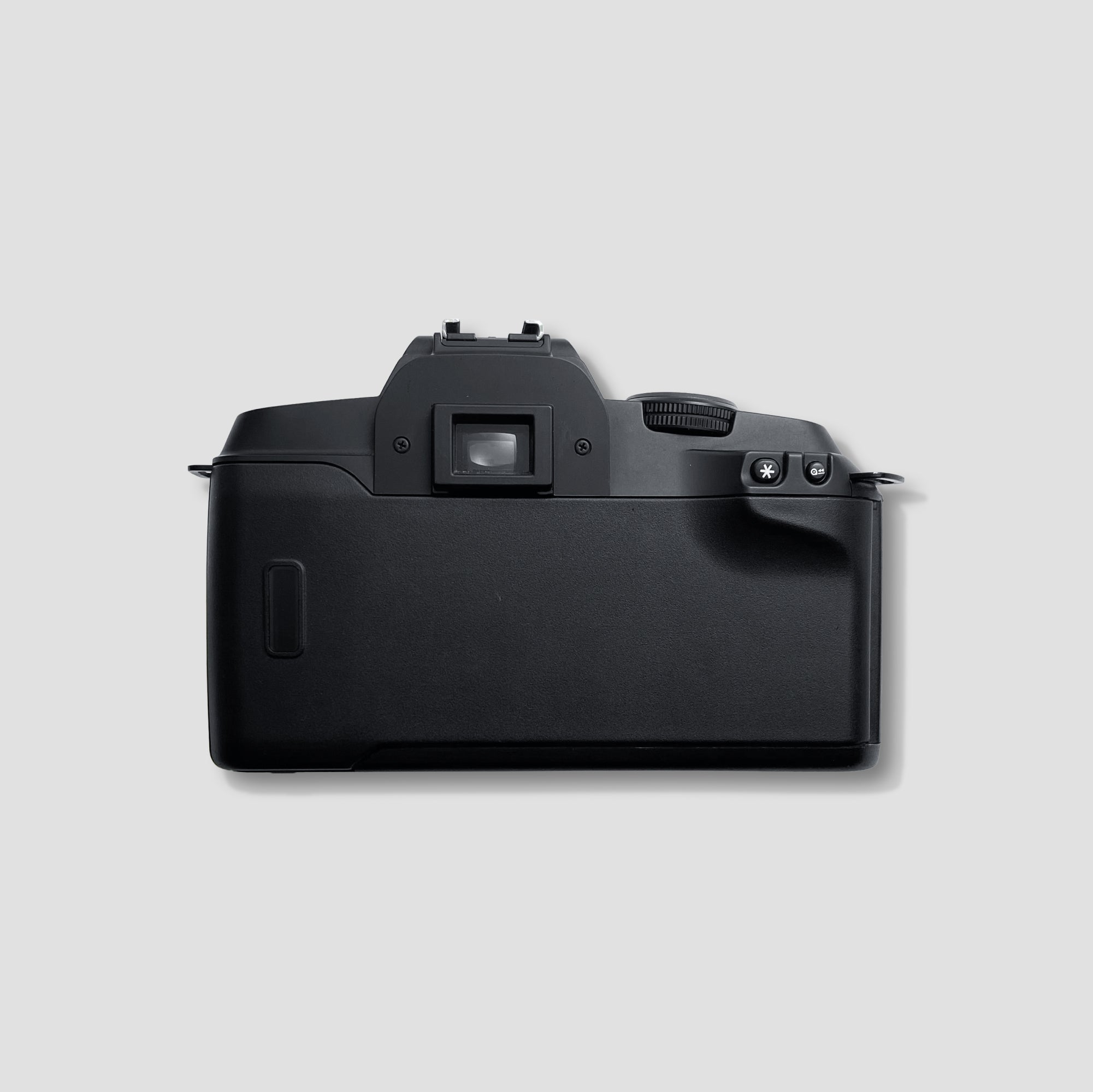 Close-up of Canon EOS 5000 camera controls, showcasing the exposure modes available.