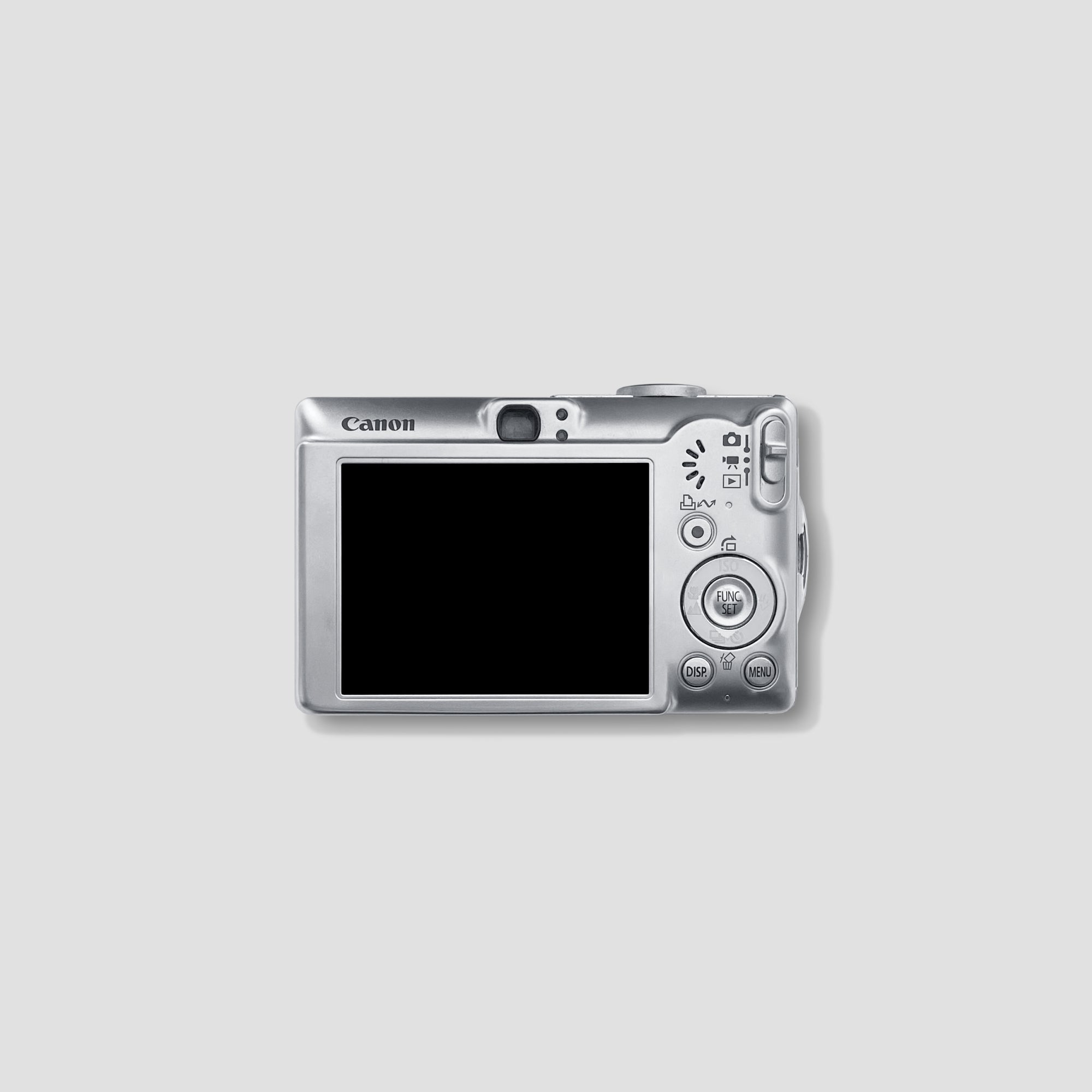 Travel-ready Canon IXUS 60 in hand, perfect for spontaneous photography