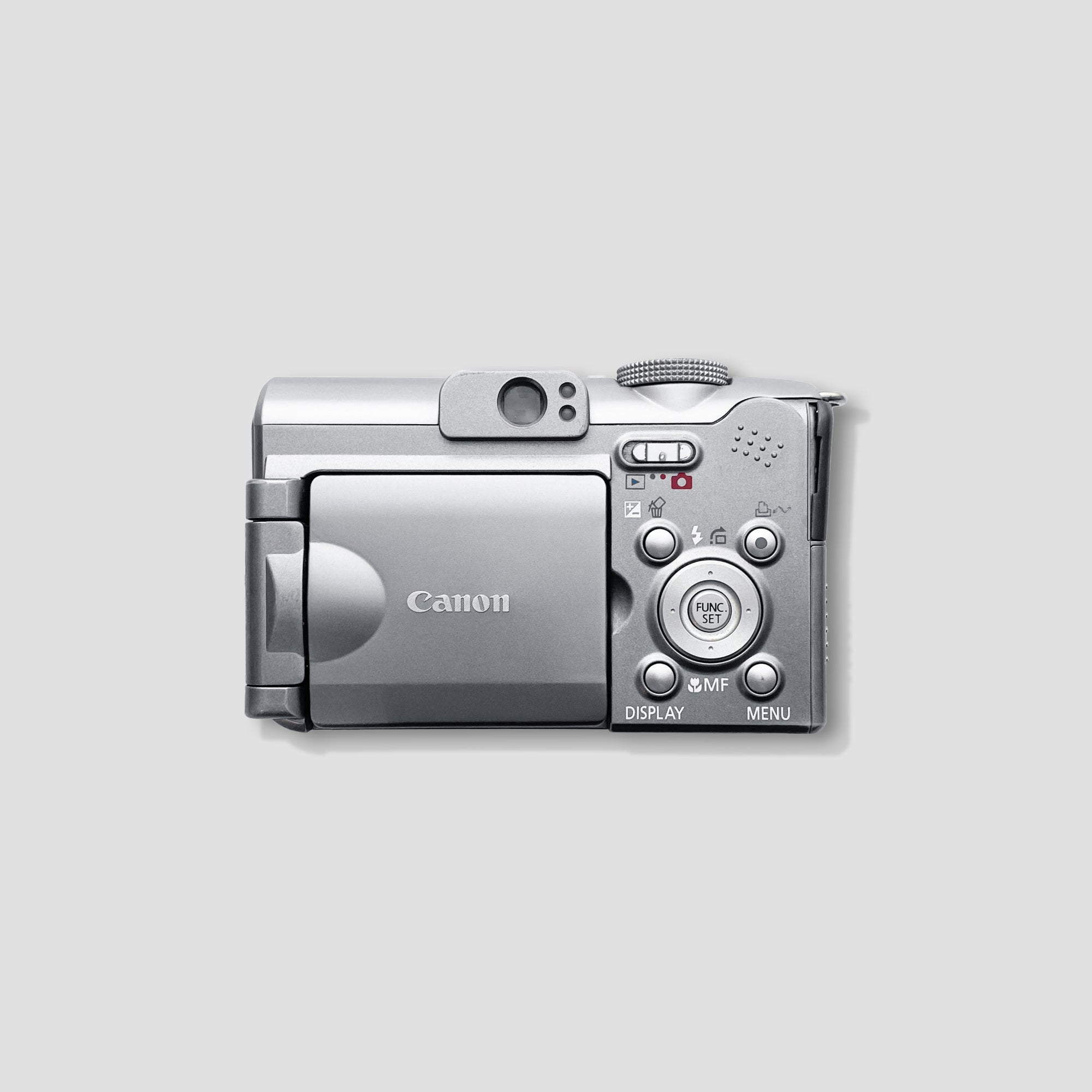 User  capturing a scenic landscape with the Canon PowerShot A620, showcasing its versatility.