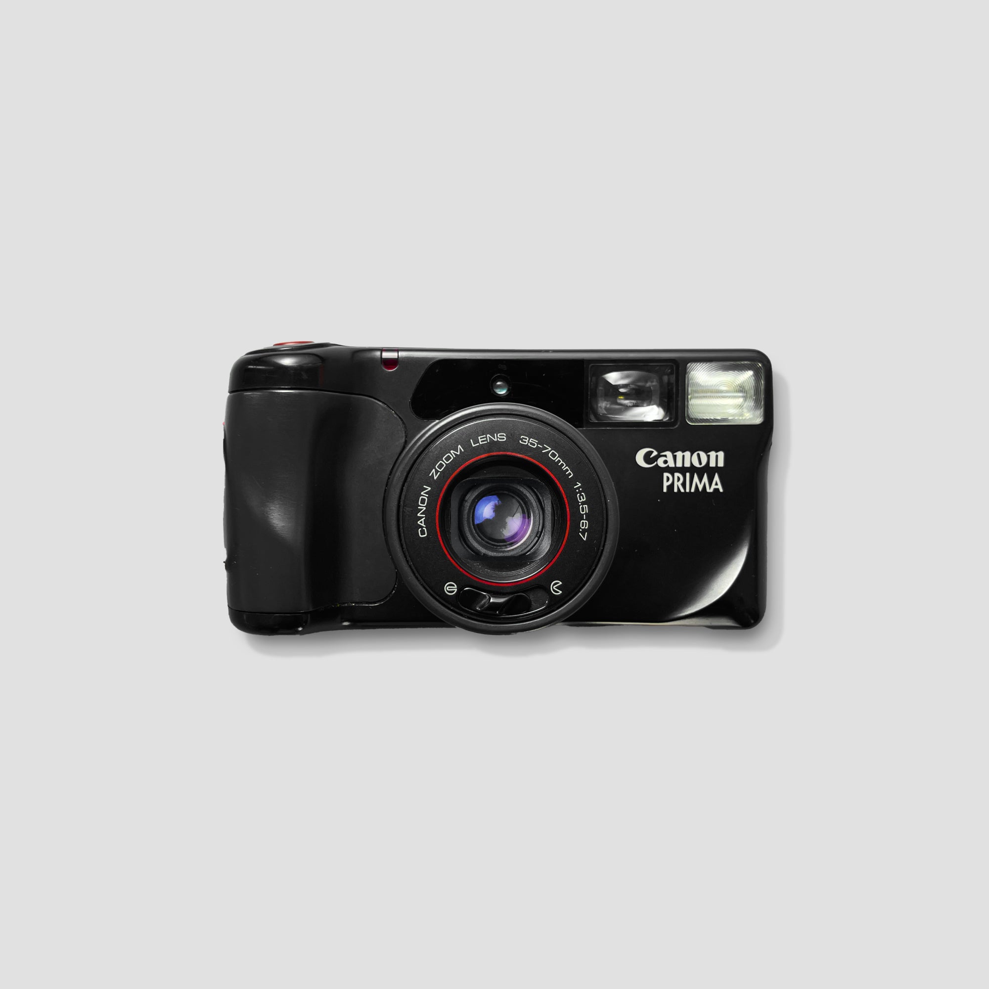 Canon Prima Zoom camera showcasing its elegant design from a side angle.