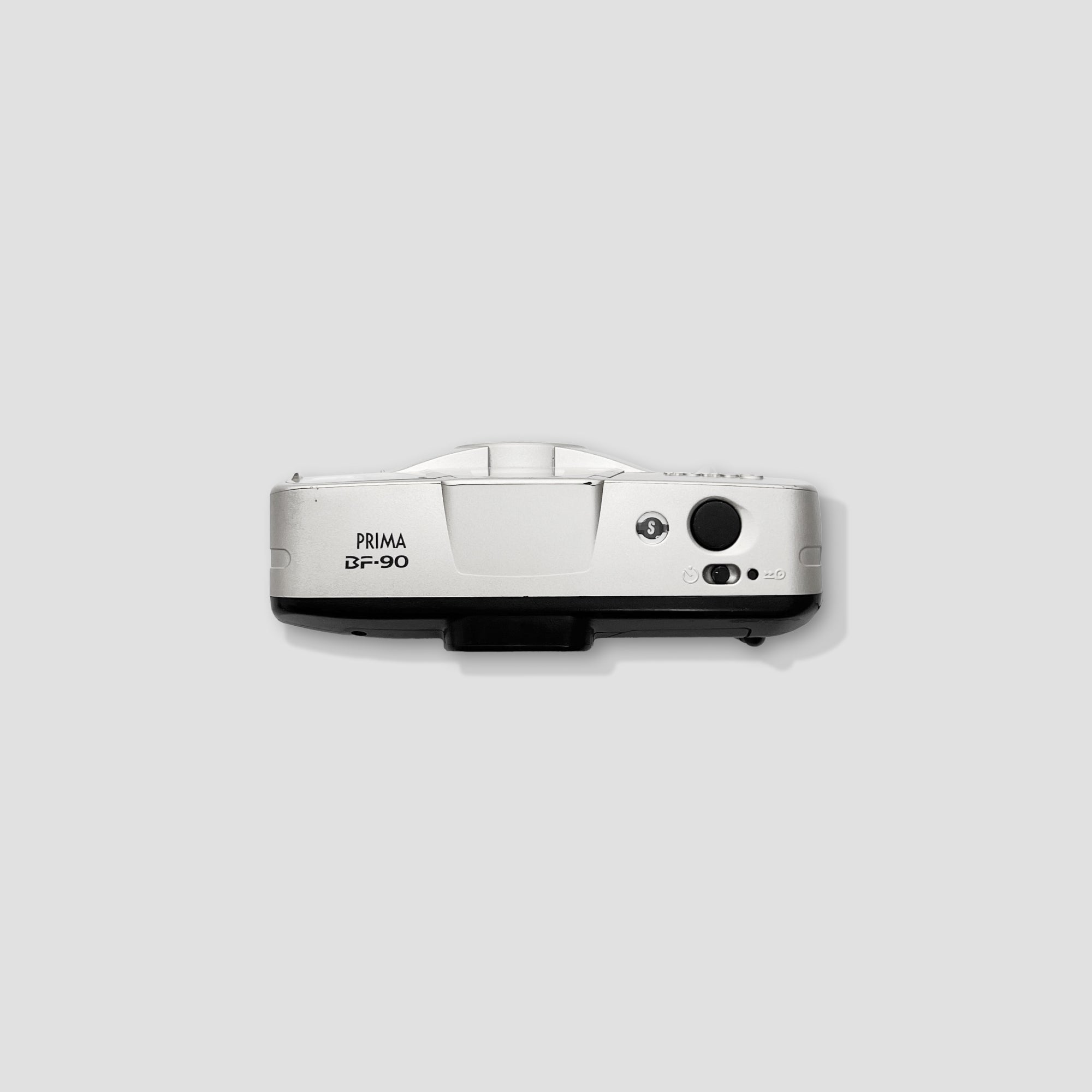 Side angle of Canon Prima BF-90 demonstrating its user-friendly controls and compact size.