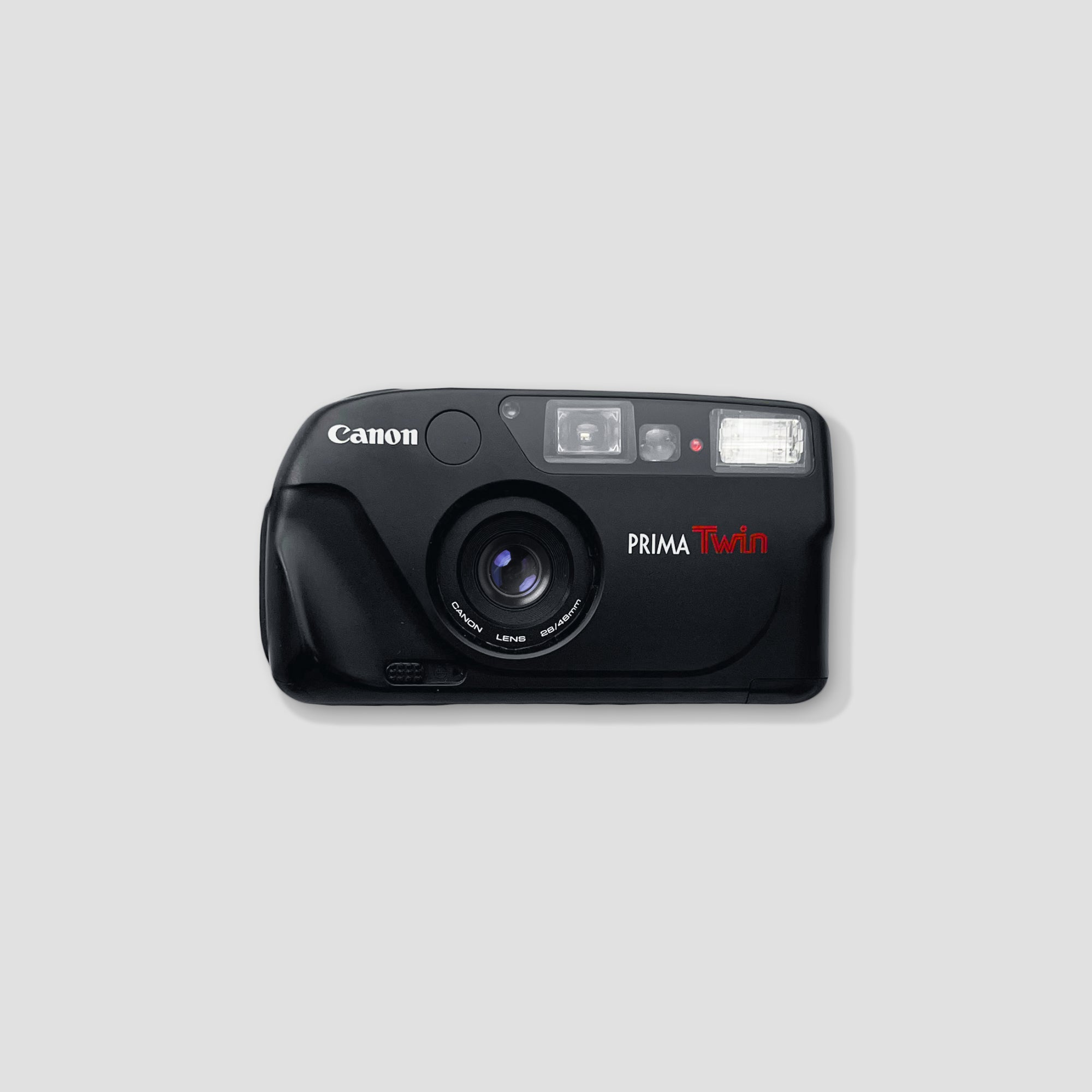 Canon Prima Twin vintage film camera with twin lenses for travel photography