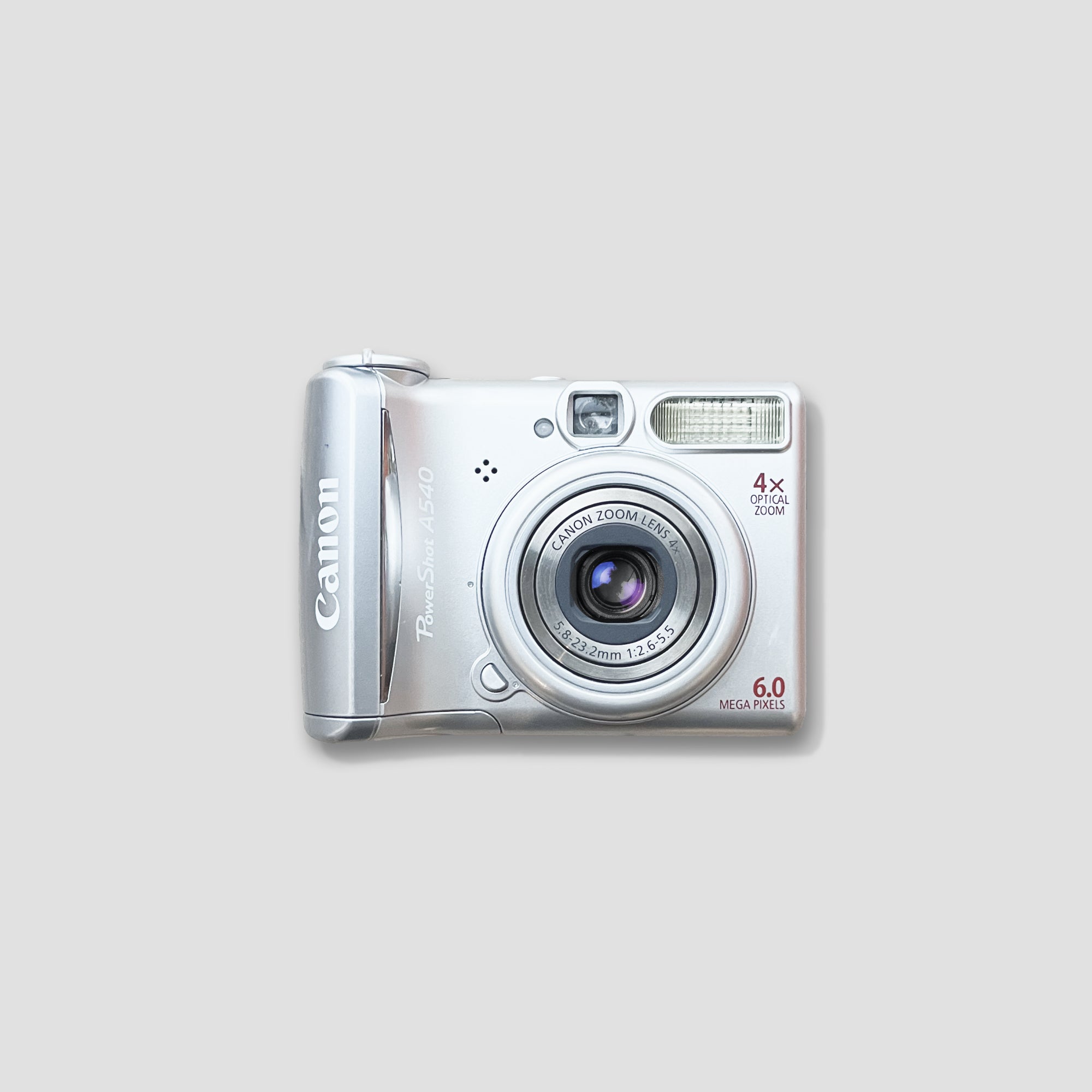 Canon PowerShot A540 side view showcasing its ergonomic grip and compact design.