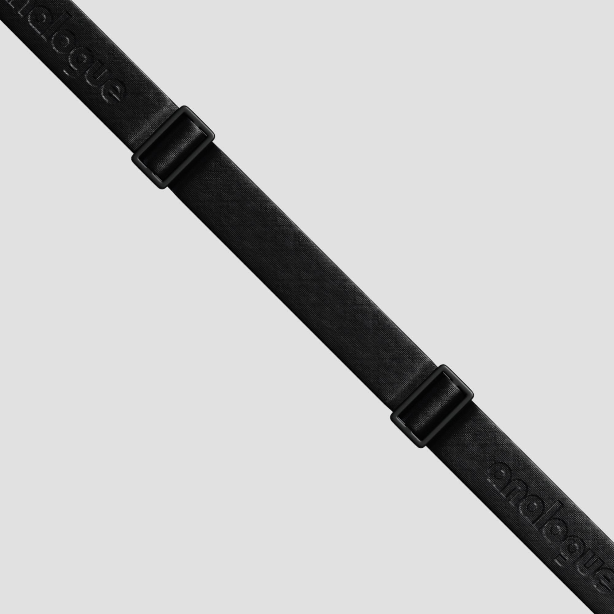 Side view of the Analogue camera sling on a DSLR camera, showing the adjustable strap and durable buckle