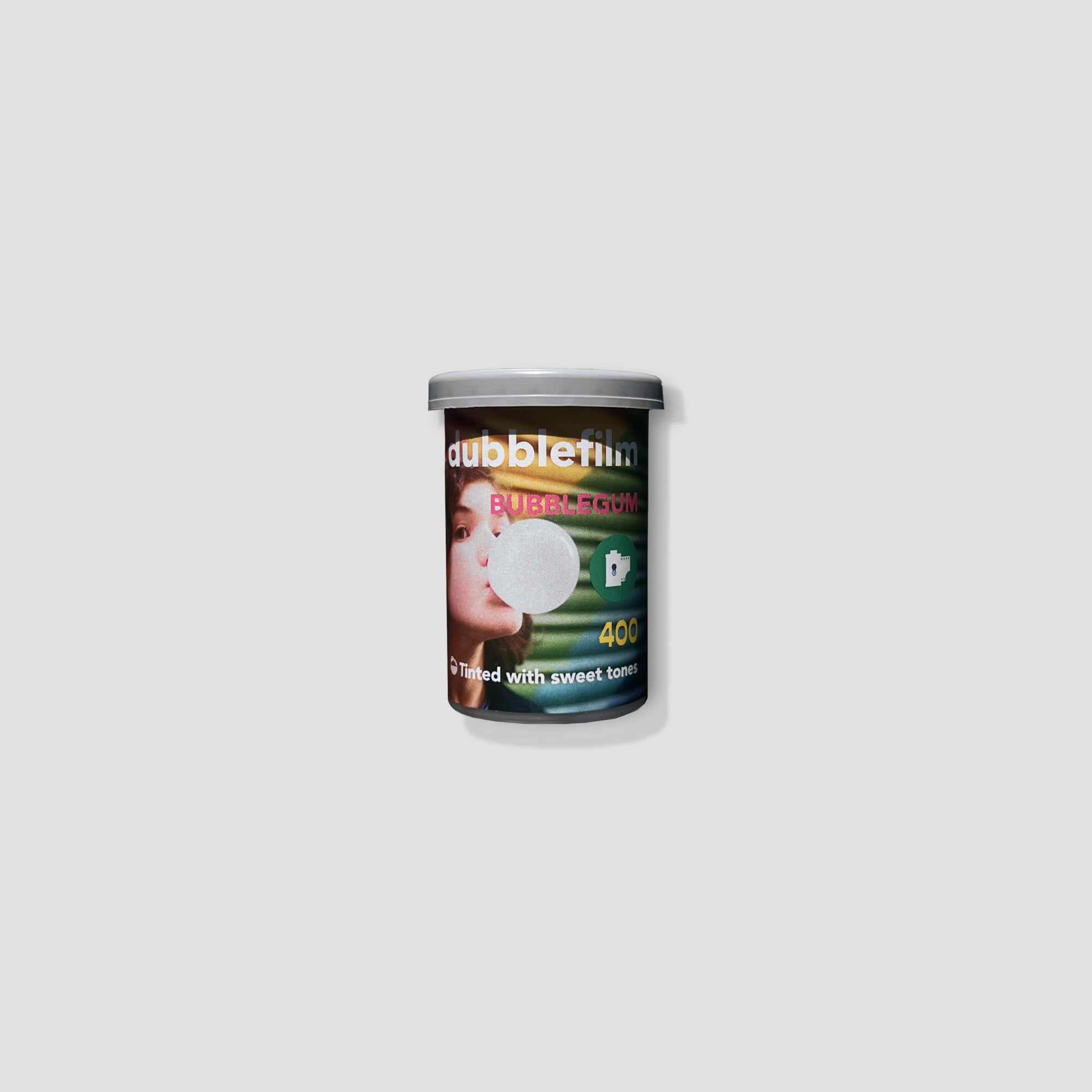 35mm film roll of Dubblefilm Bubblegum 400 with pastel pink tones