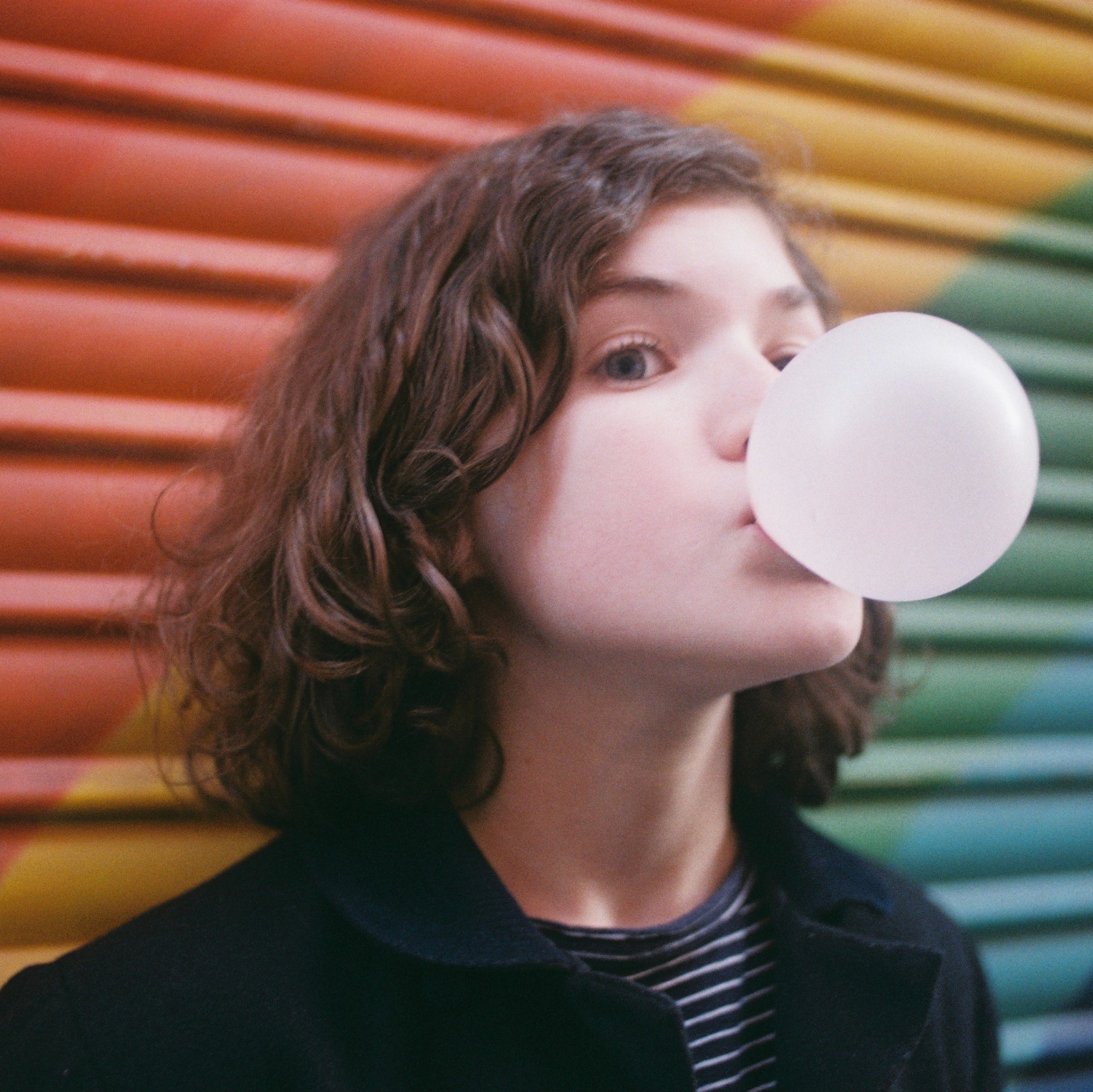 35mm film roll of Dubblefilm Bubblegum 400 with pastel pink tones