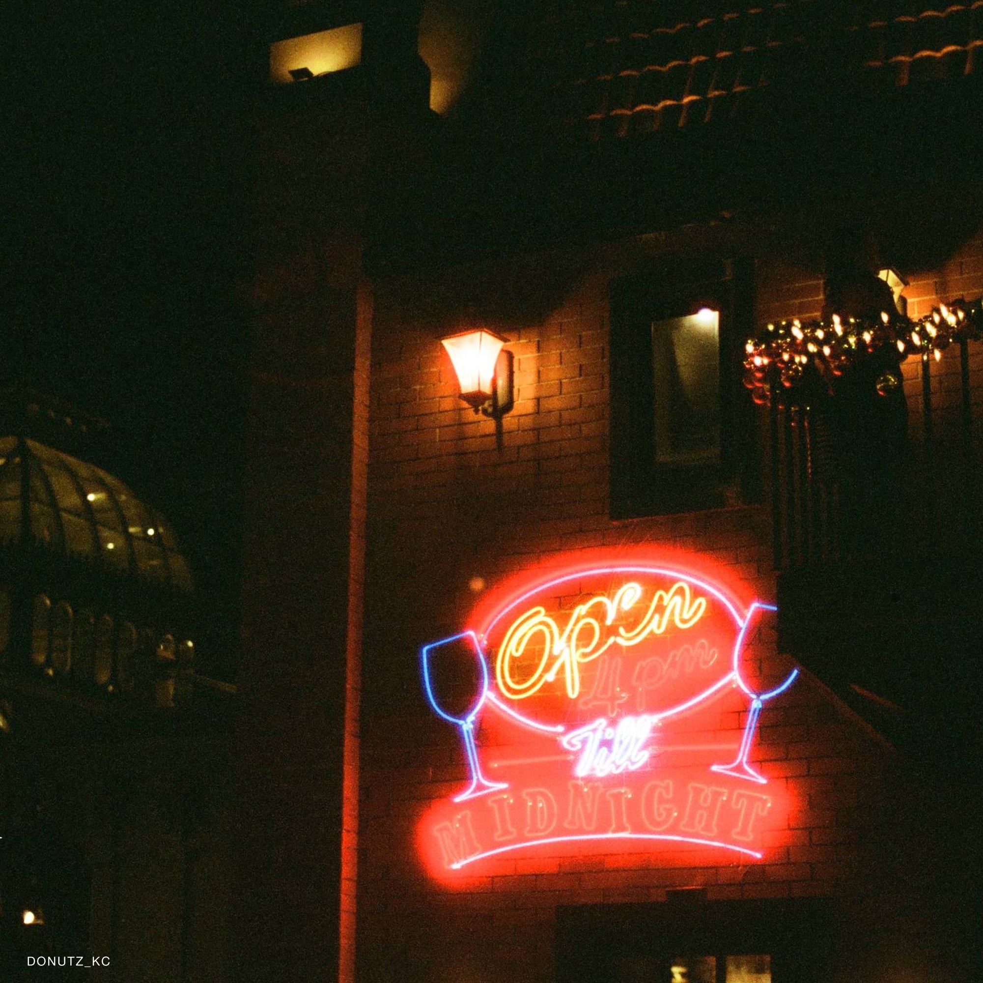 Close-up of developed photos taken with Sora 200D, showcasing rich colors and sharp details.