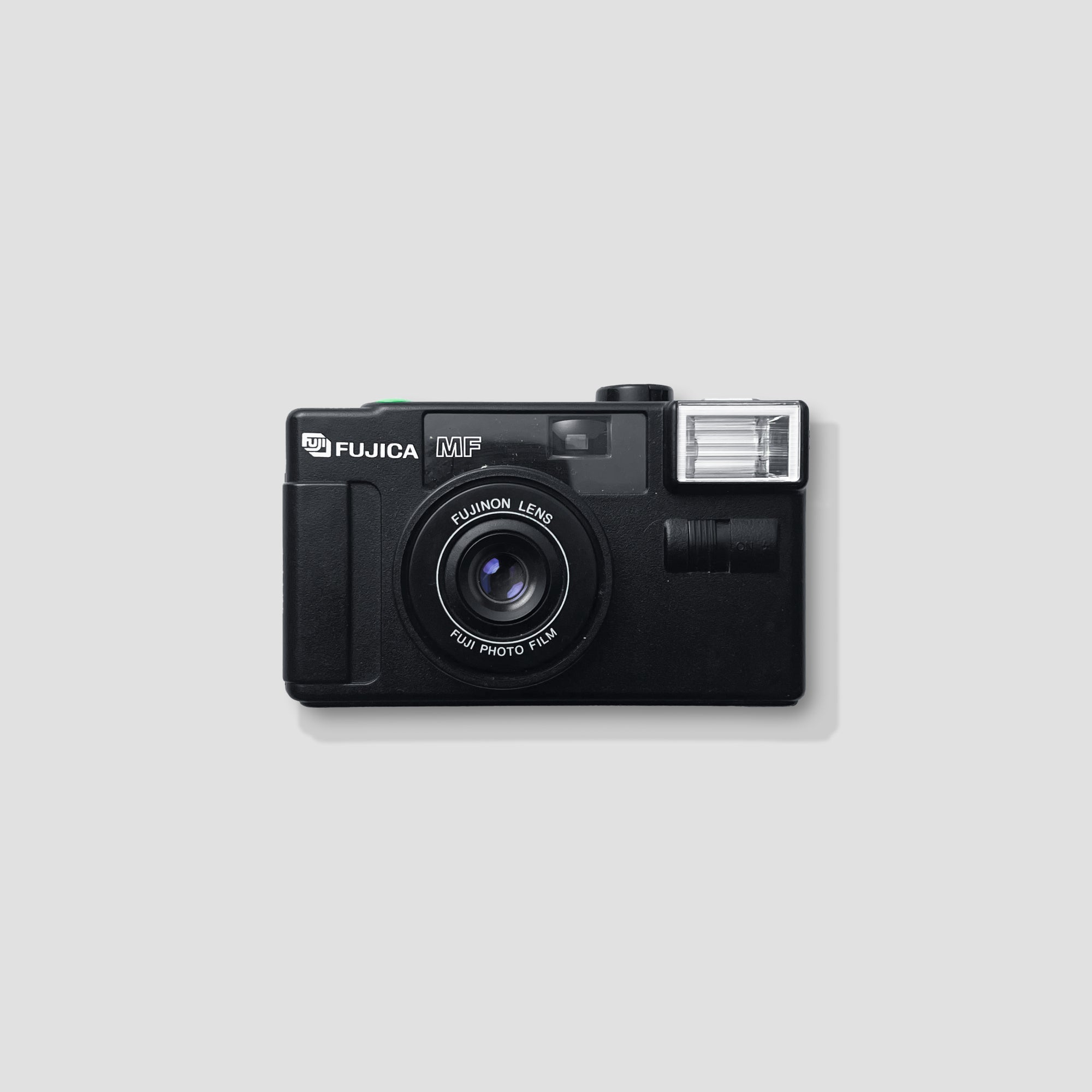 Fujifilm Fujica MF Film Camera showcasing its vintage design from the late 90s.