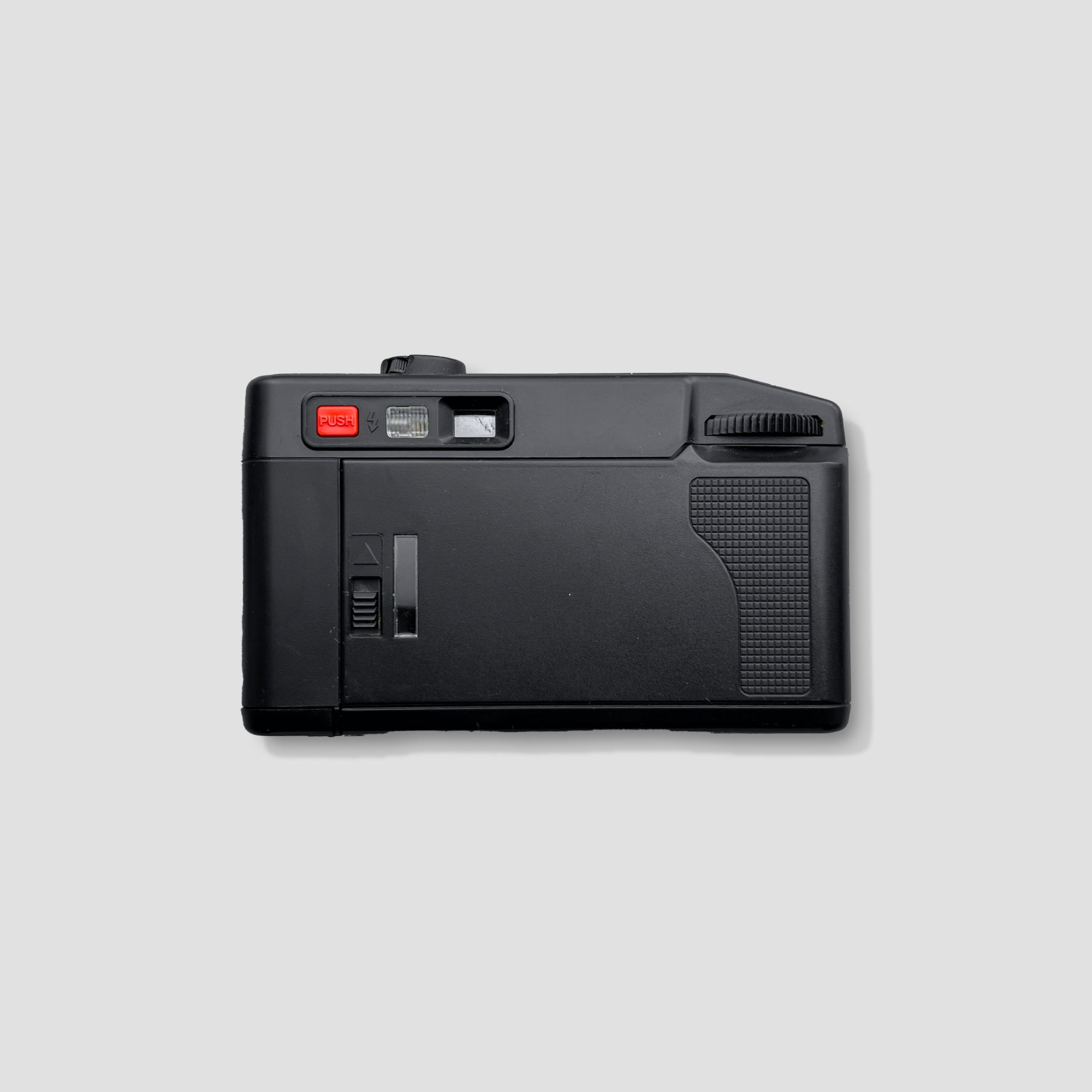 Close-up of the Fujifilm DL-10 camera highlighting its controls and lens.