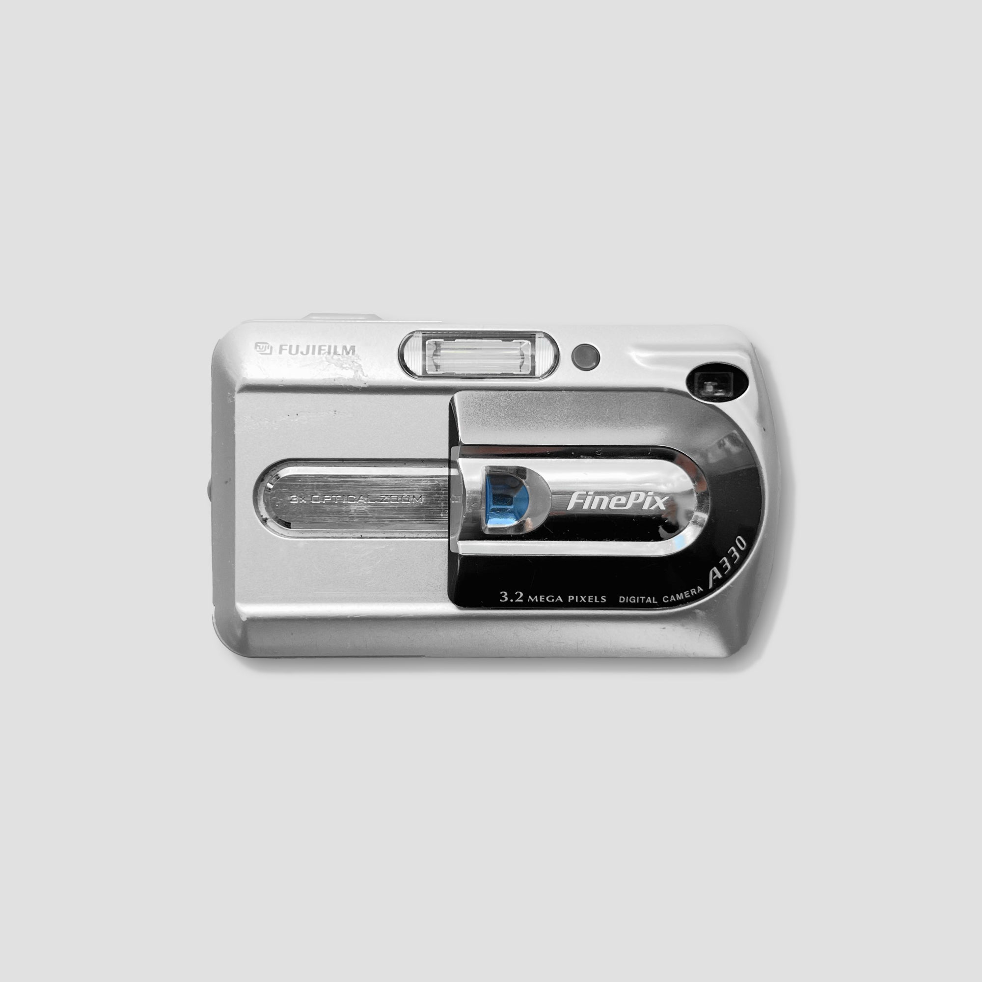 Fujifilm camera in hand, demonstrating portability and ease of use