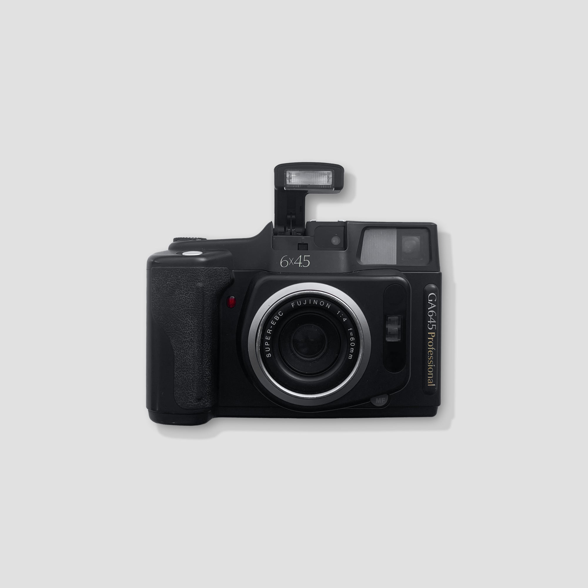 Close-up of the Fujinon 60mm f/4 lens on the Fujifilm GA645, ideal for capturing stunning portraits.