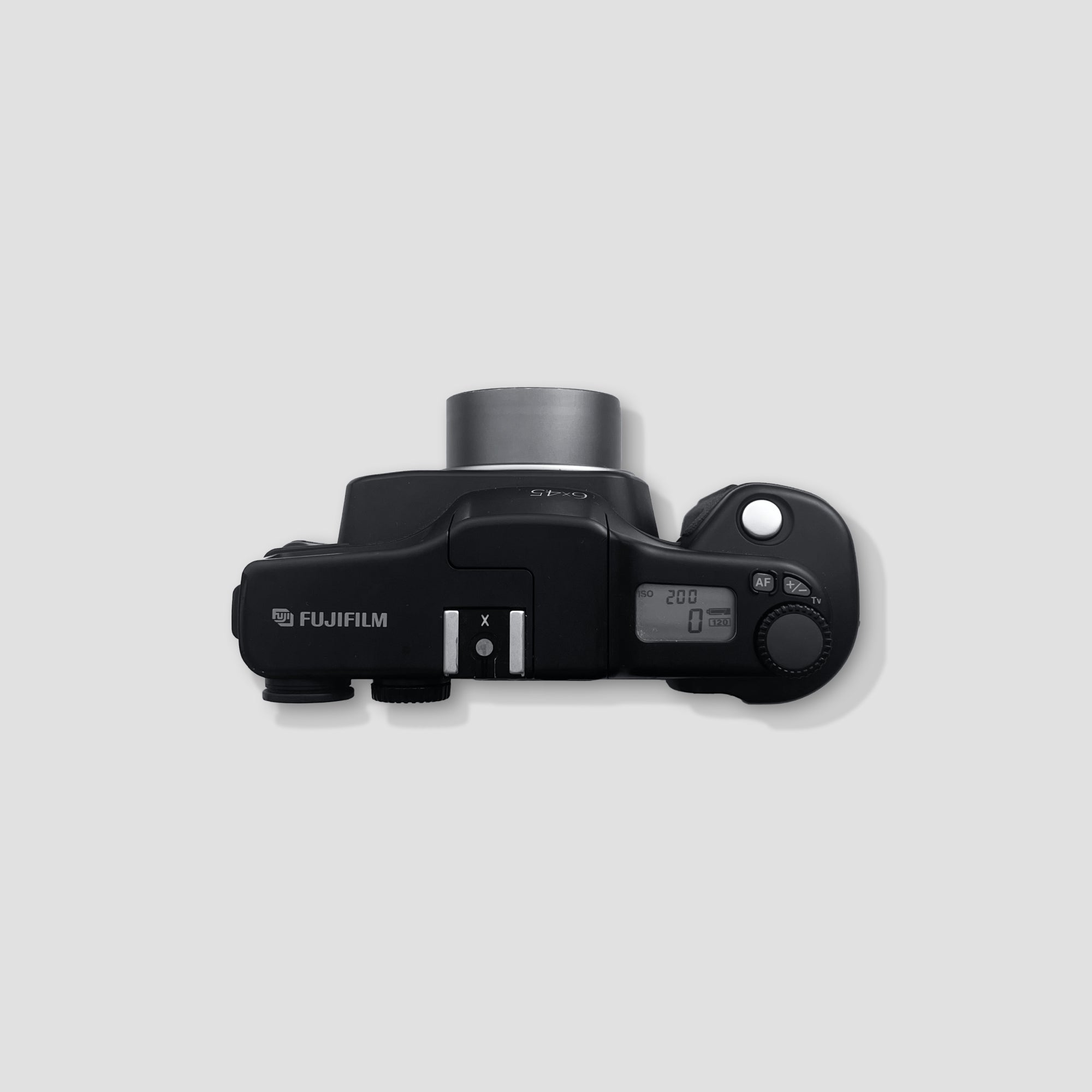 Fujifilm GA645 Professional camera in use for landscape photography, highlighting its compact design.
