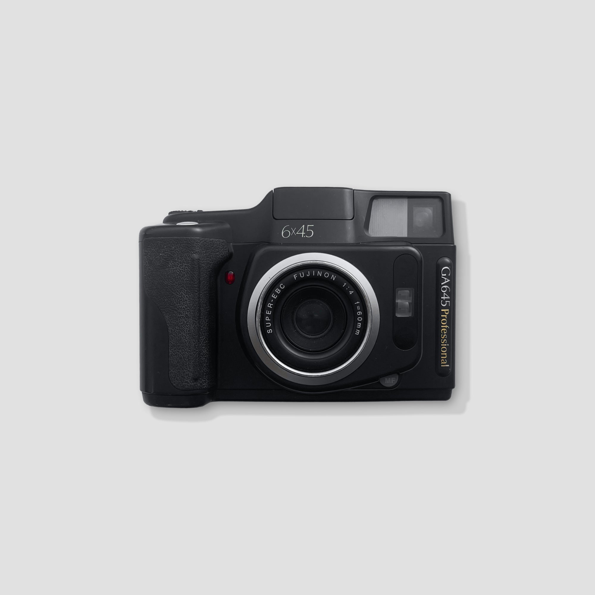 Fujifilm GA645 Professional camera in use for landscape photography, highlighting its compact design.
