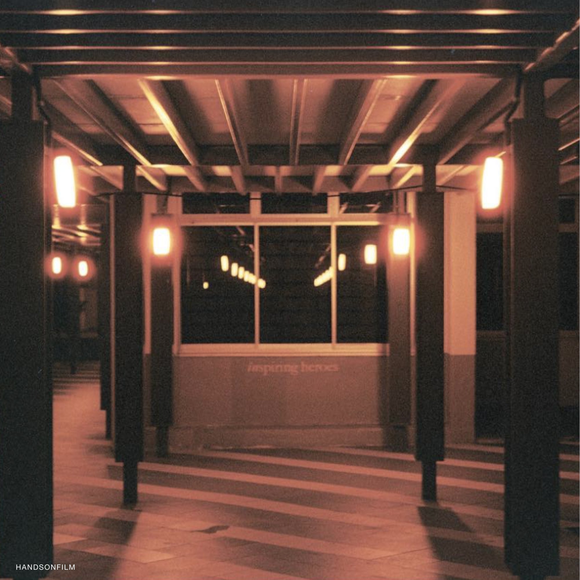Close-up of Vivid RedScale 400 Film, showcasing its vintage aesthetic for photography.