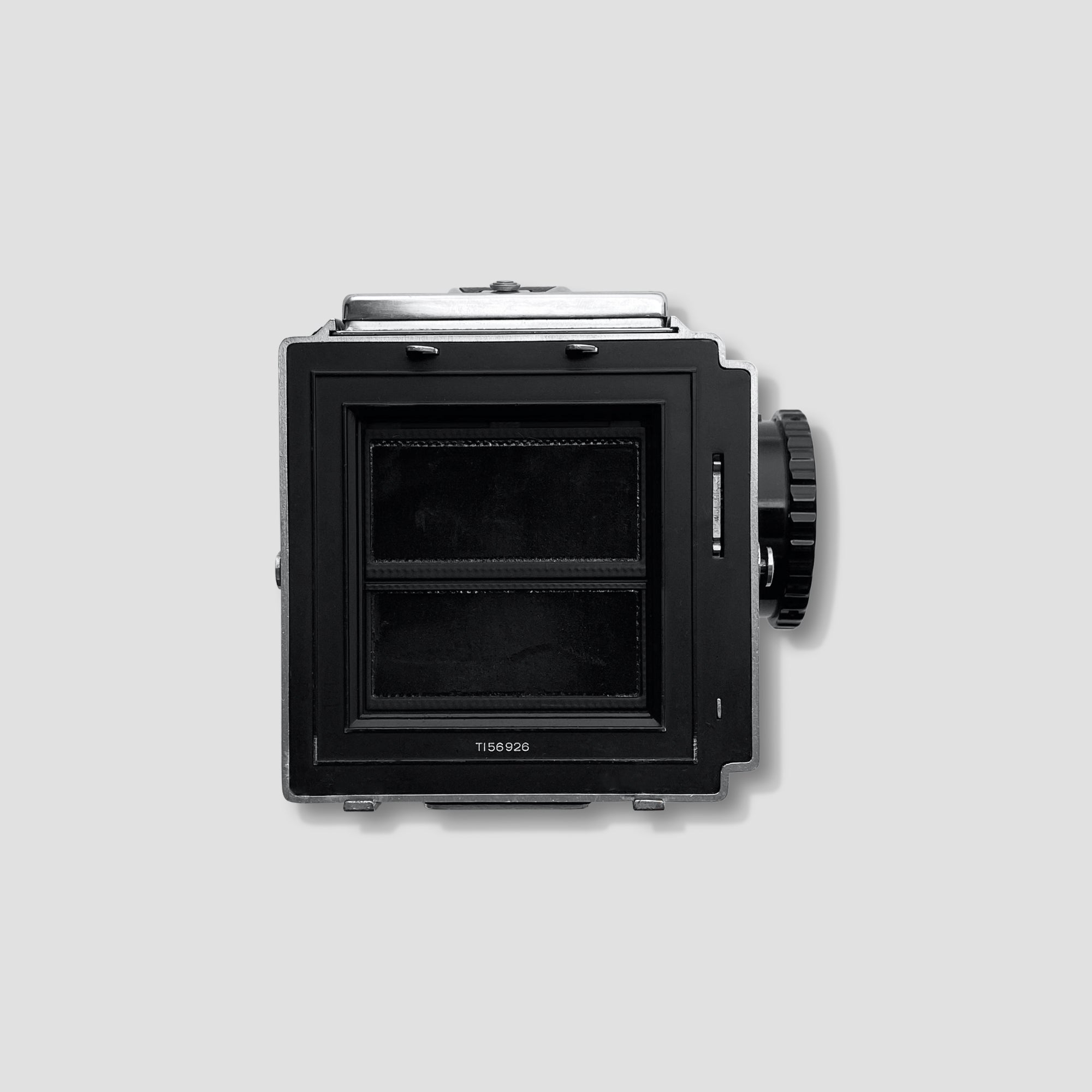 Hasselblad 500C film camera with Planar 80mm lens displayed at an angle, showcasing its detailed design.