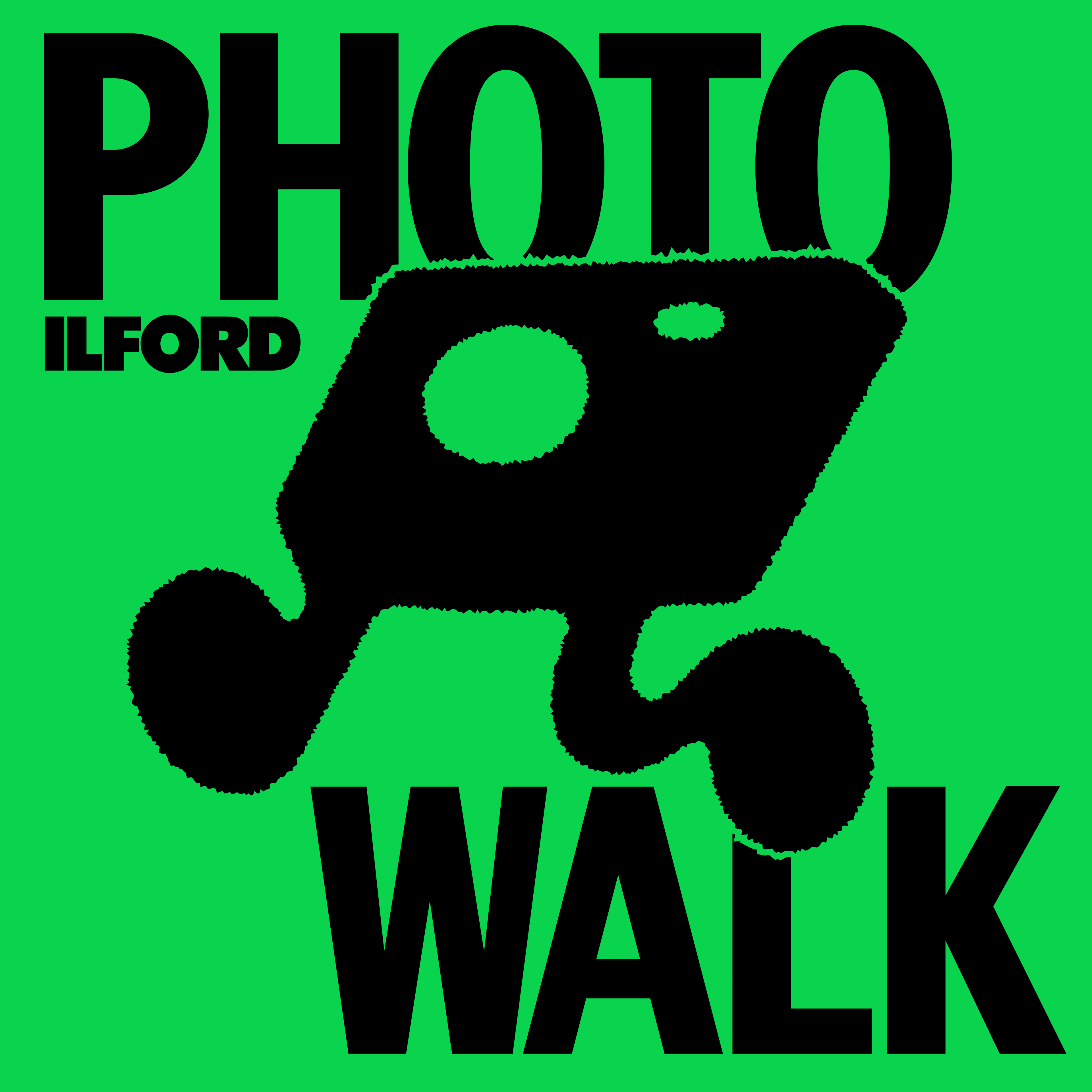 Photographer taking photos during Amsterdam photowalk with Ilford film