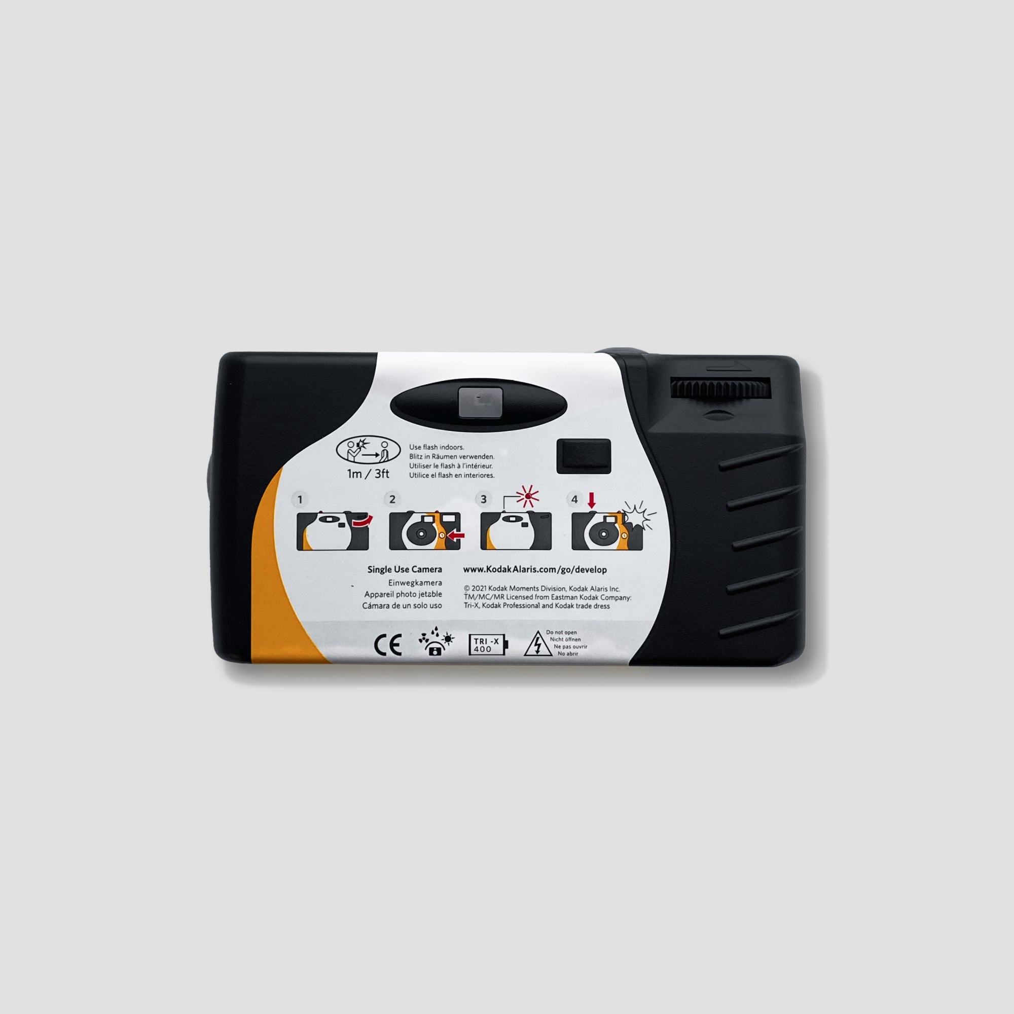 Close-up of Kodak disposable camera with black and white film loaded for film photography