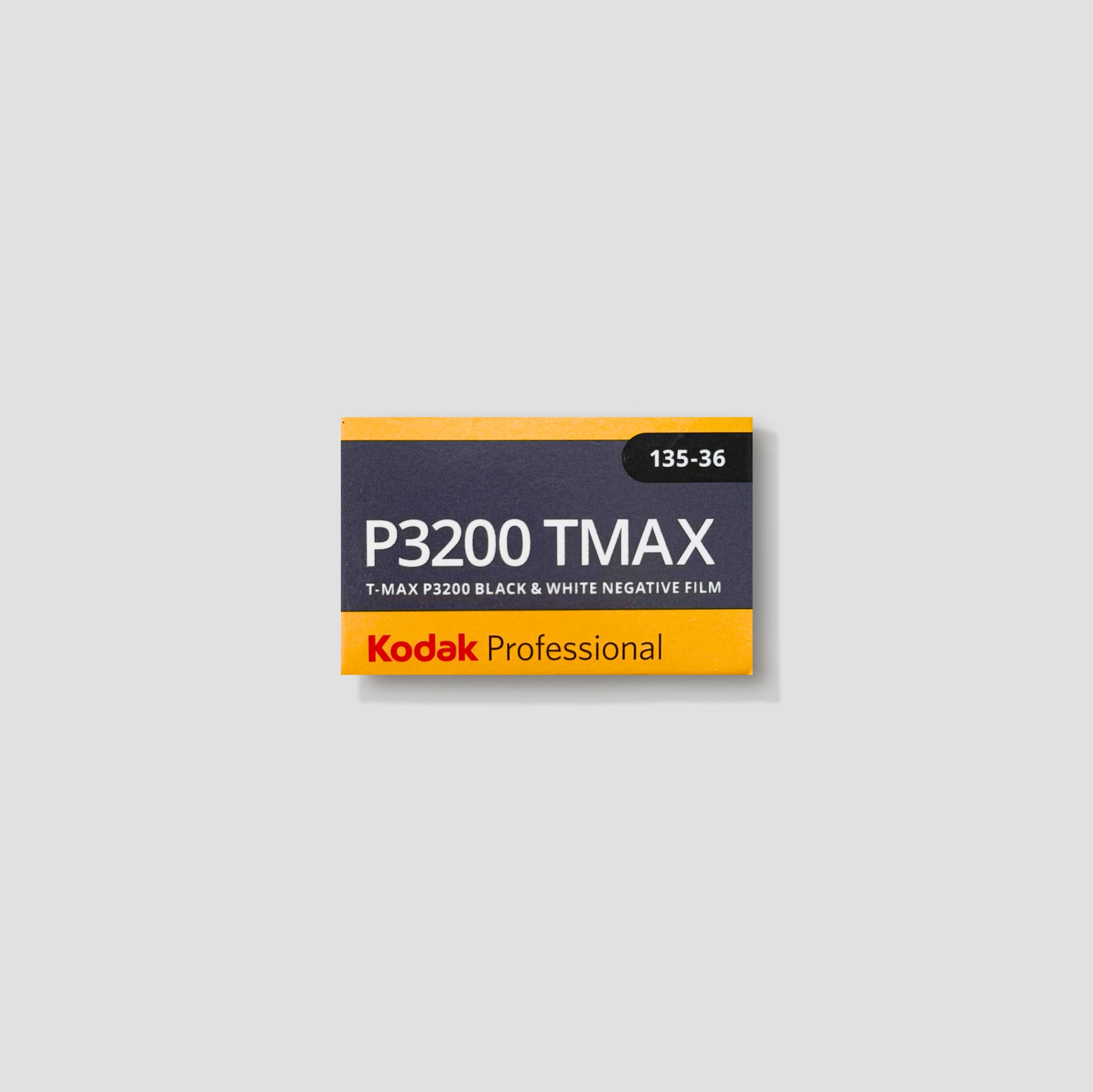 Close-up of Kodak T-Max P3200 film roll showcasing its high-speed black and white capabilities for night photography.