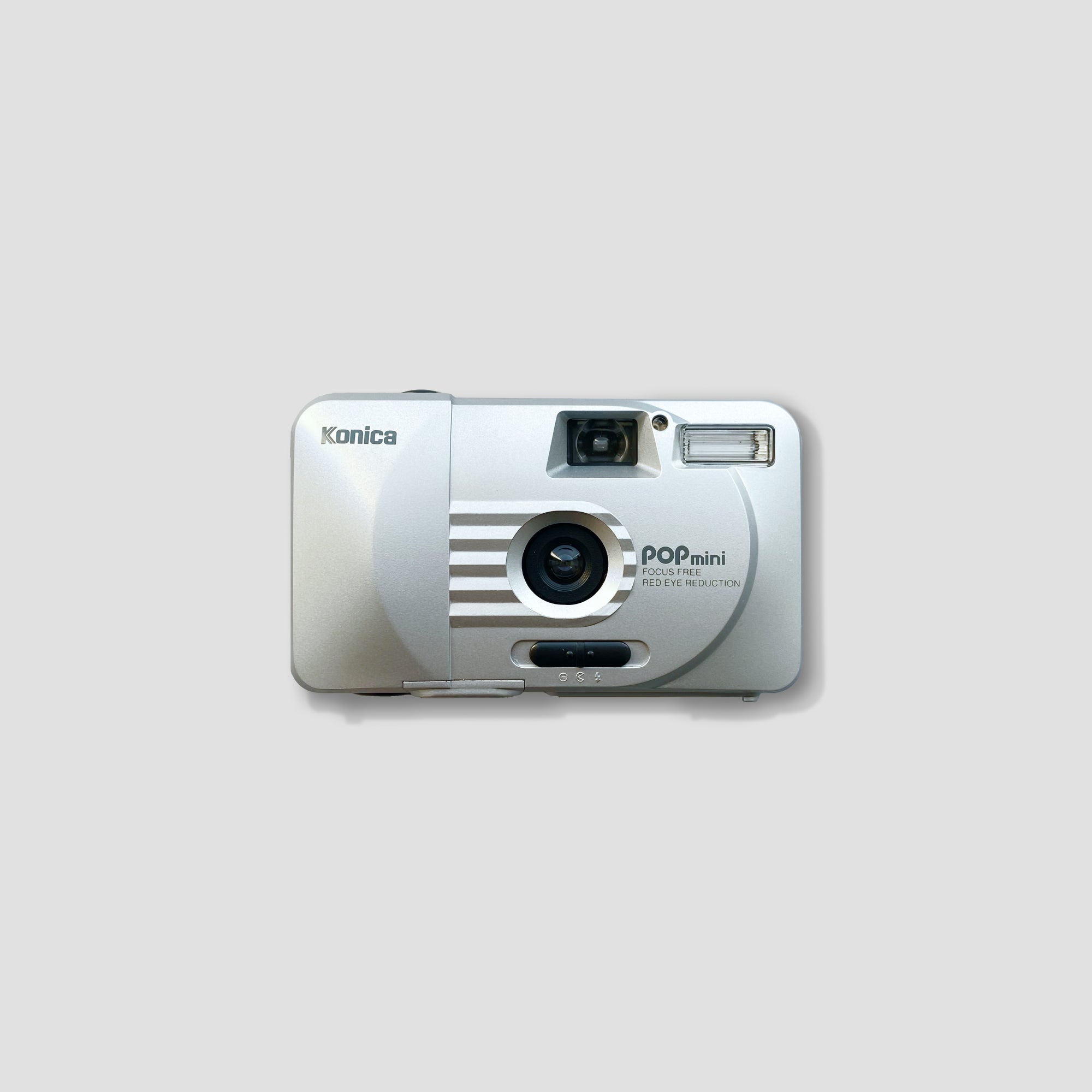 Front view of the Konica Pop Mini showcasing its compact design and lens.