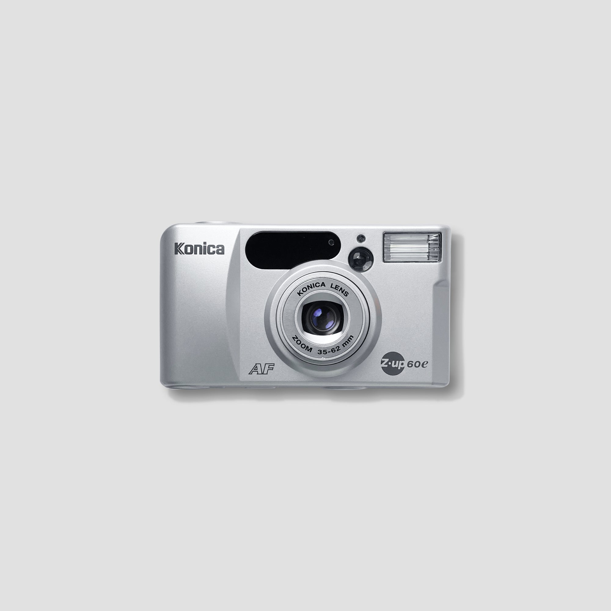 Front view of the Konica Z-up 60e compact film camera, showcasing its sleek design and zoom lens.
