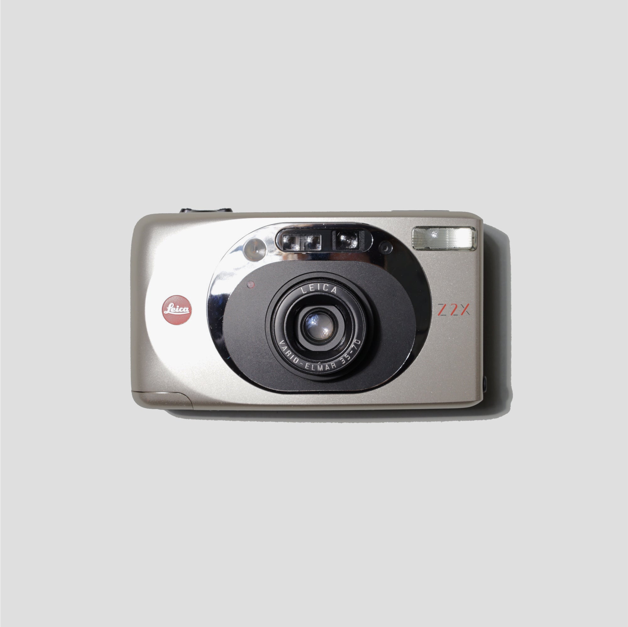 Leica Z2X Grey camera with zoom lens at an outdoor event