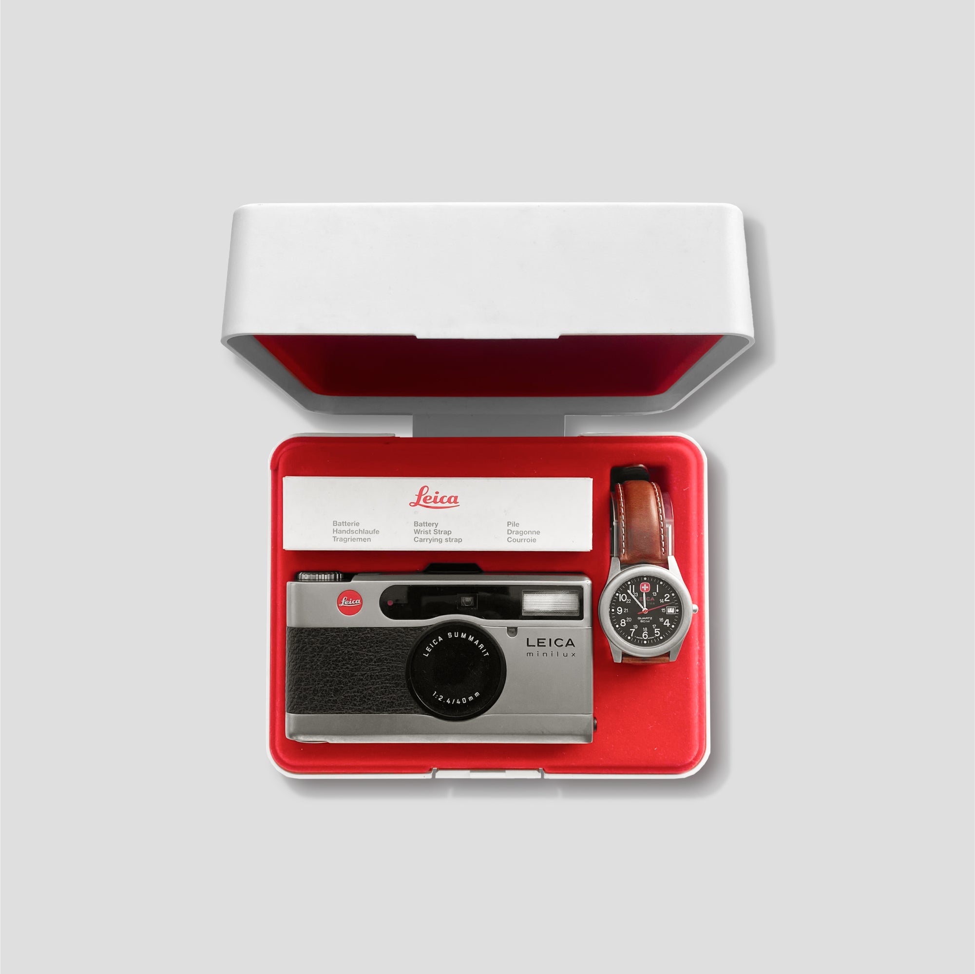 Leica Minilux Compact Camera with a sleek design and included watch
