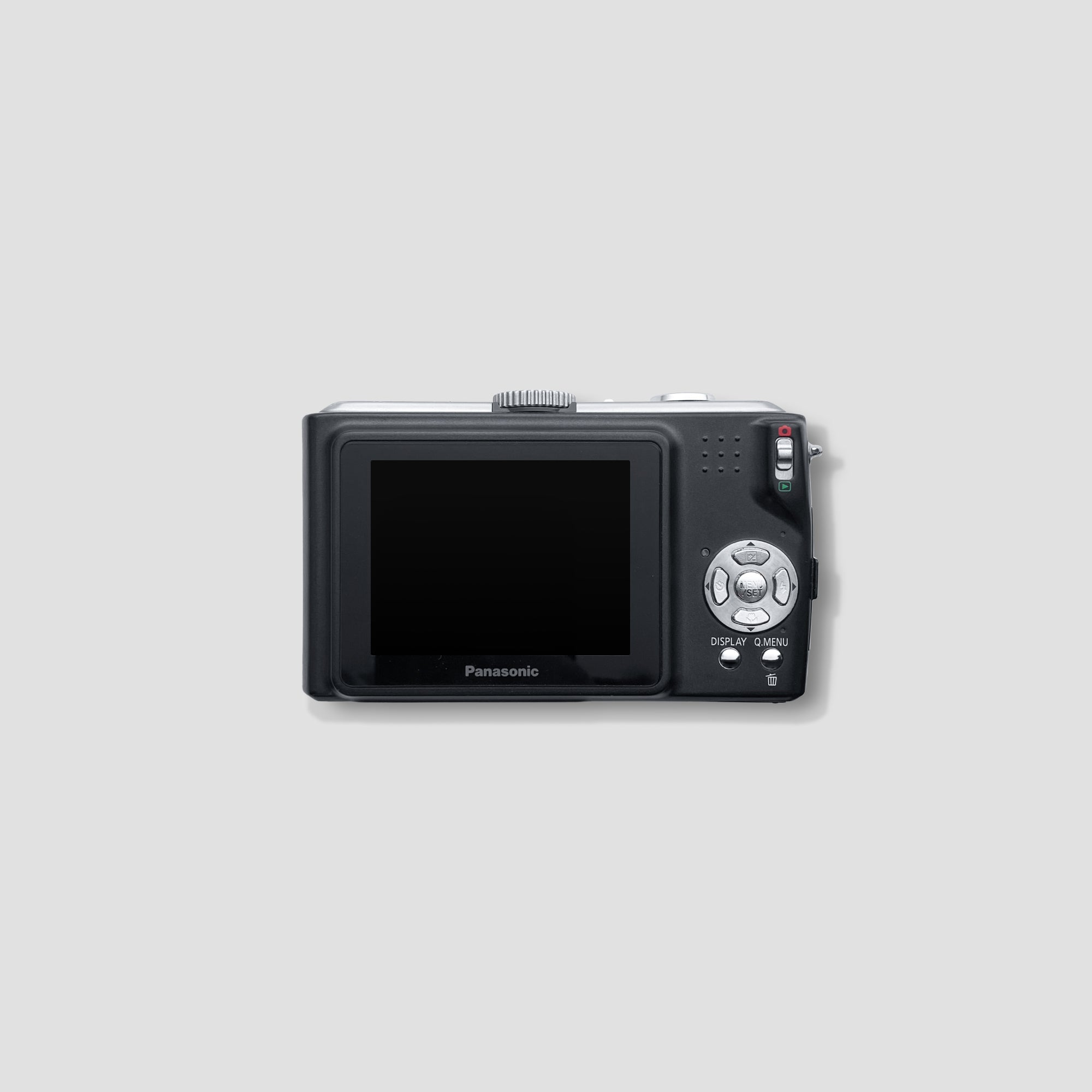 Side view of the compact travel camera highlighting its portable design