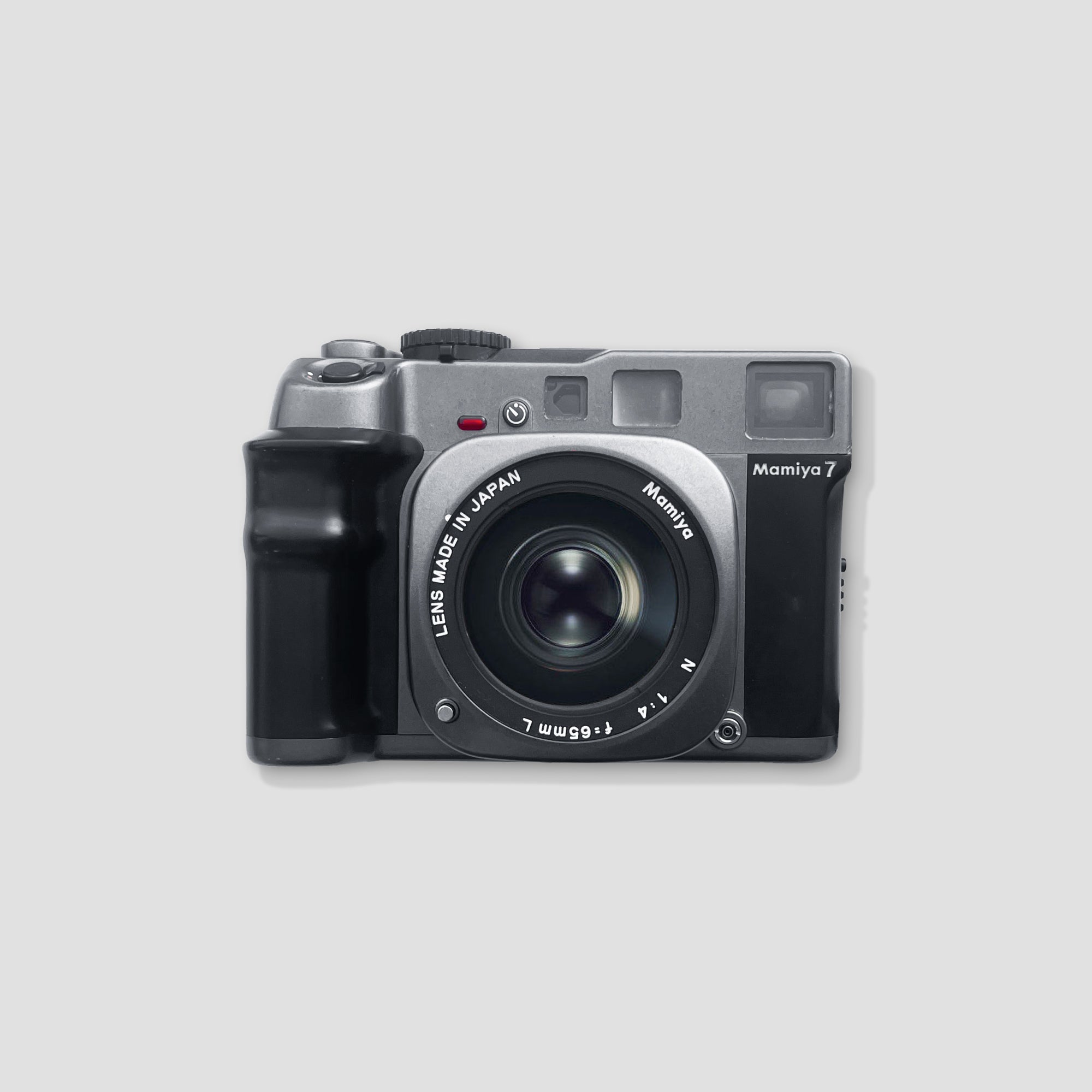 Mamiya 7 camera shot from the front showing its lens and body