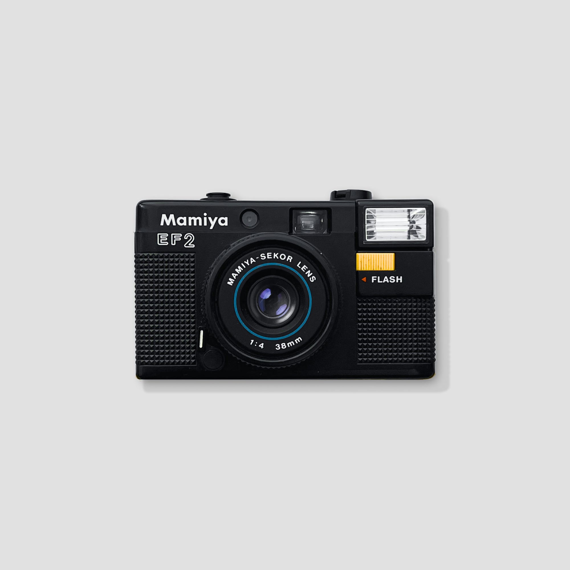 Close-up of Mamiya EF2 camera with interchangeable lens attached