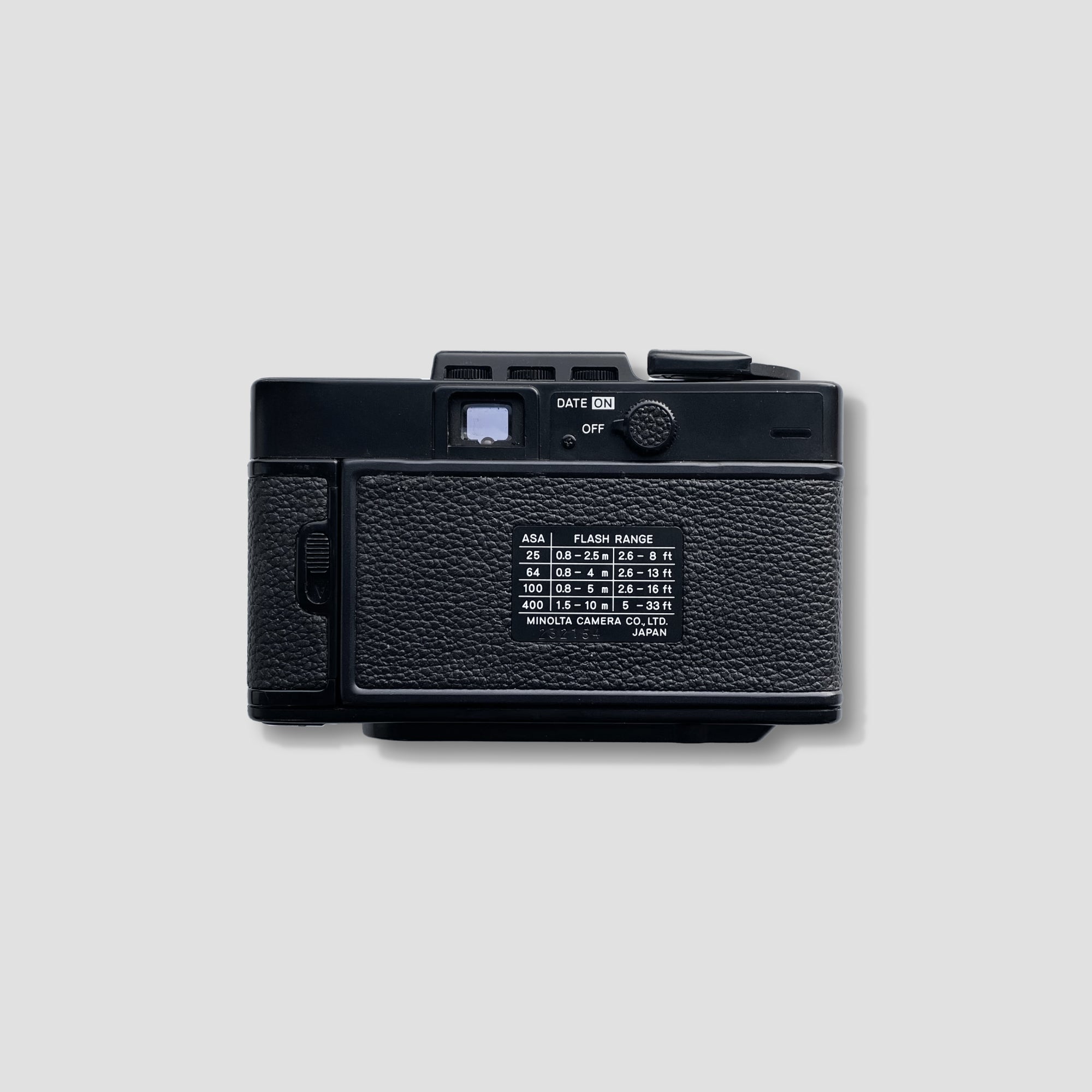 Back view of the Minolta Hi-Matic SD showing controls and film compartment