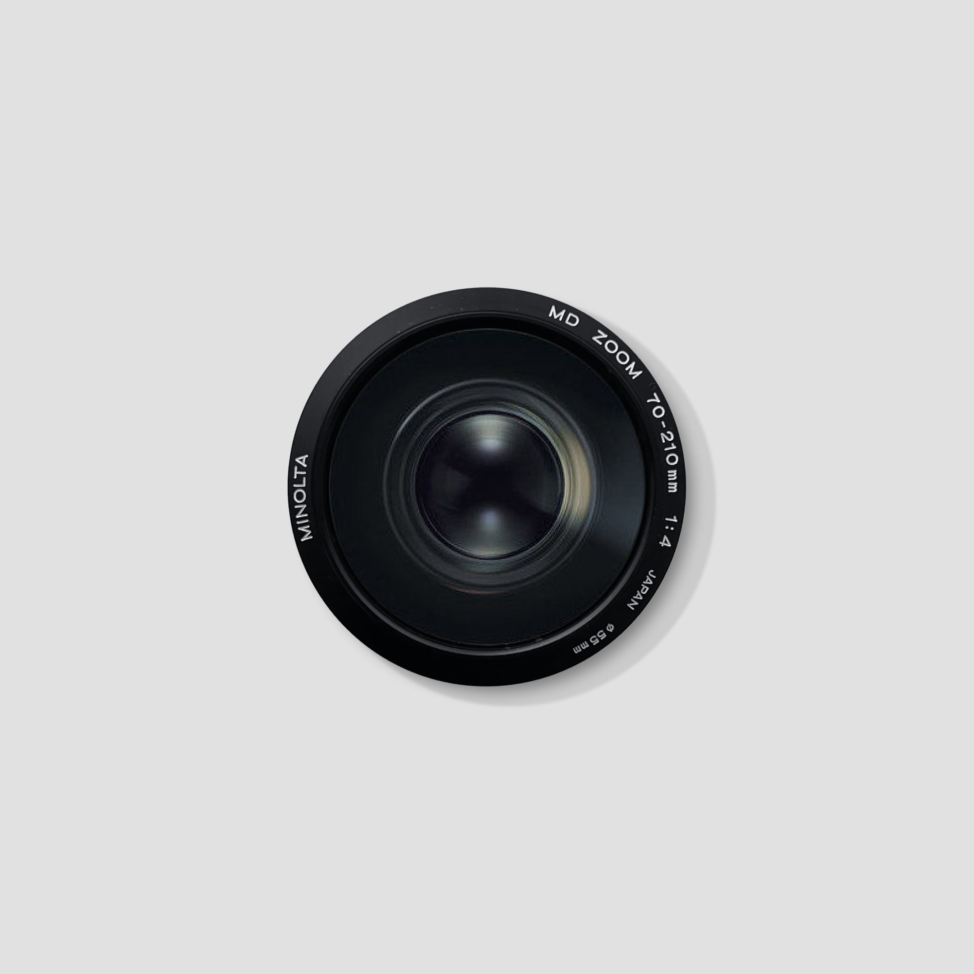 Minolta MD Zoom 70-210mm F4 lens mounted on a camera for detailed shot