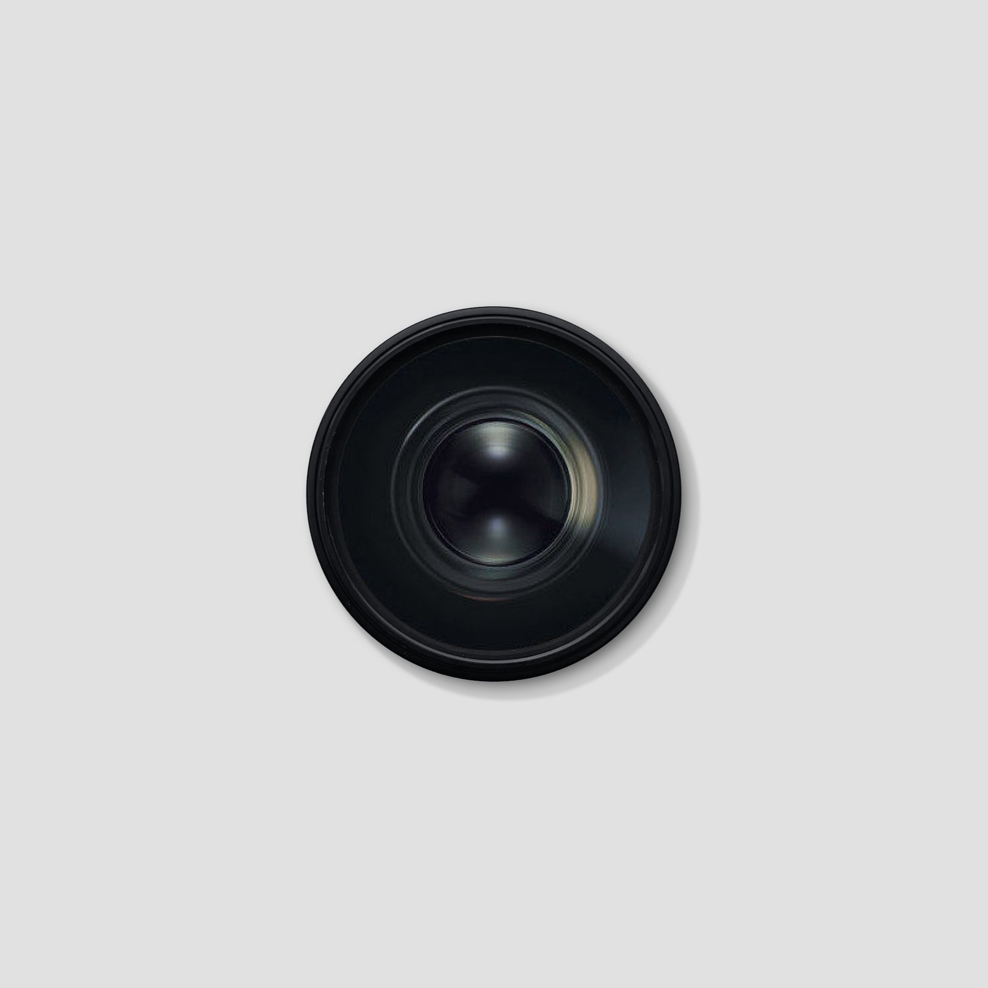 Nikon AF Micro Nikkor 60mm lens mounted on a camera, capturing intricate details during a portrait shoot.