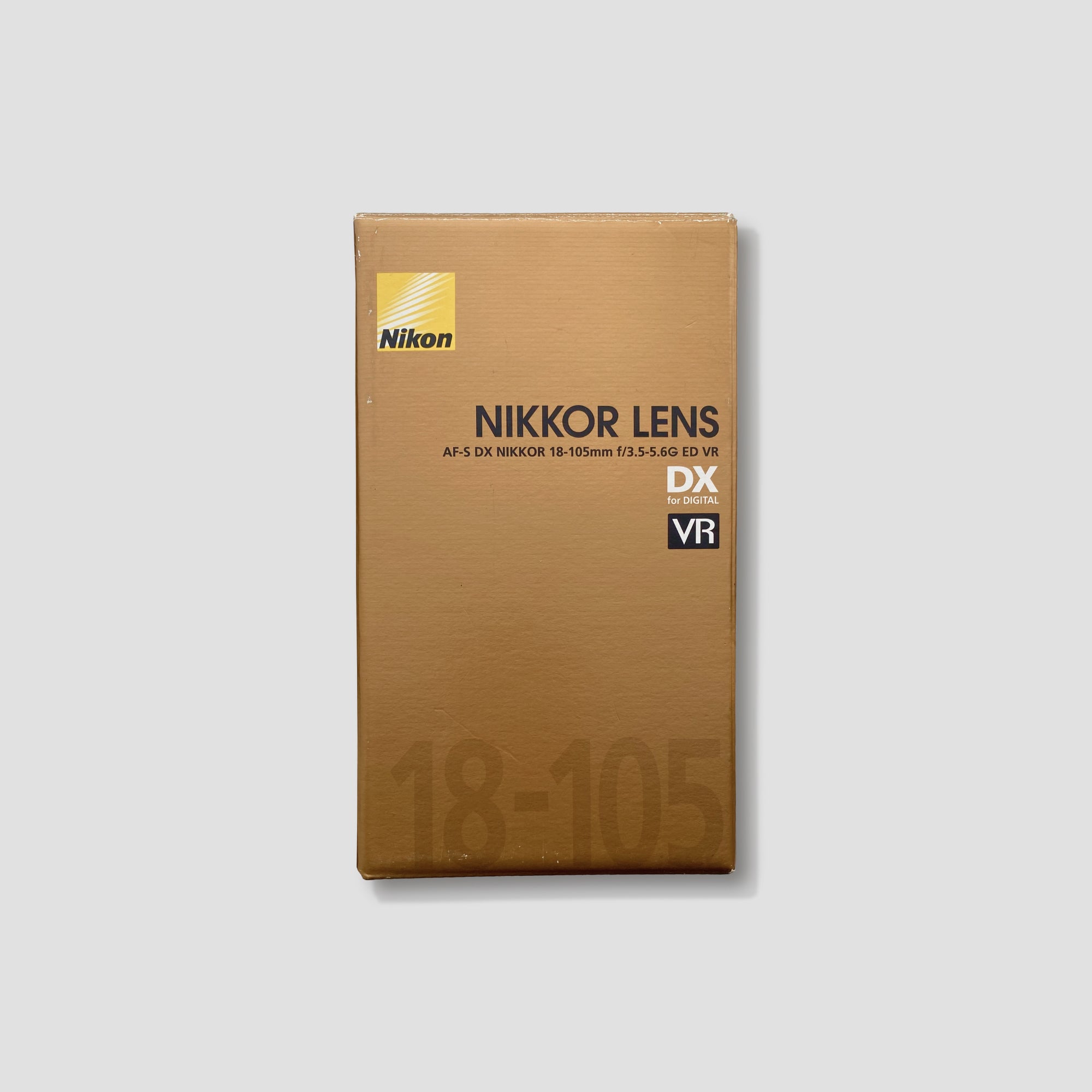 Side angle of Nikon zoom lens demonstrating build quality and zoom ring