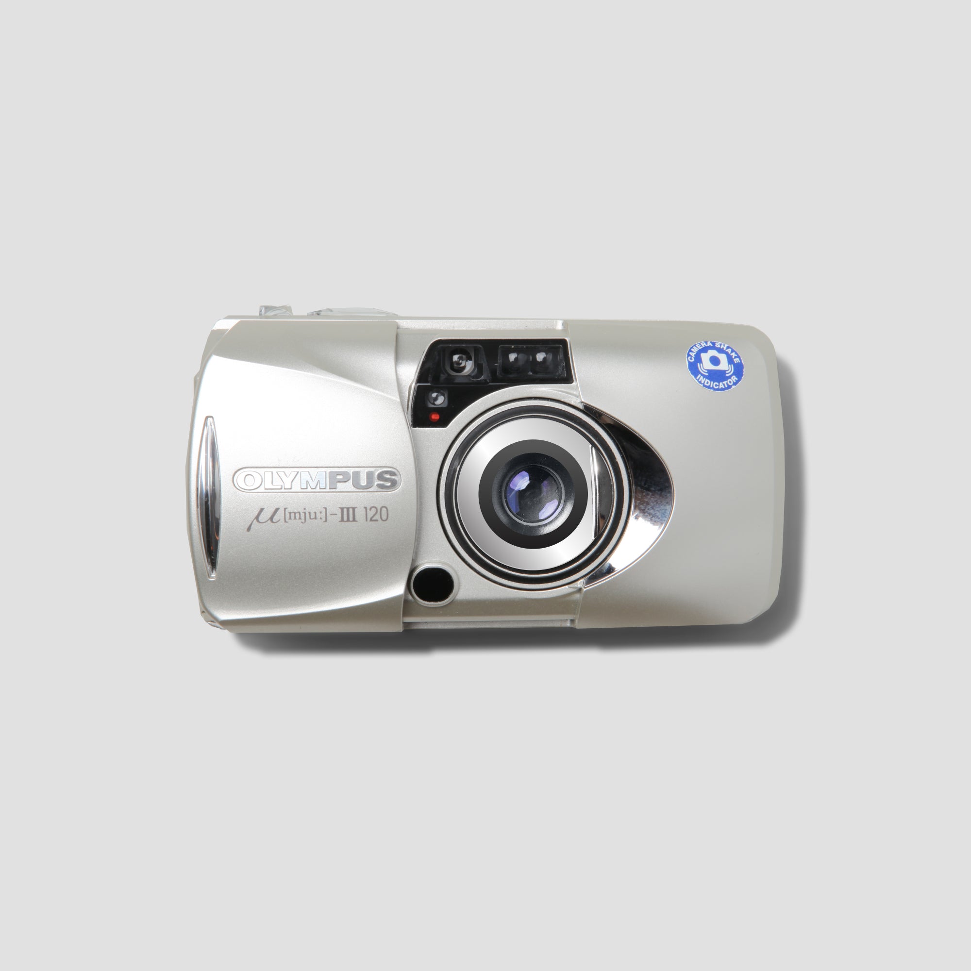 Olympus MJU III Zoom 120 compact film camera with zoom feature visible from the side.