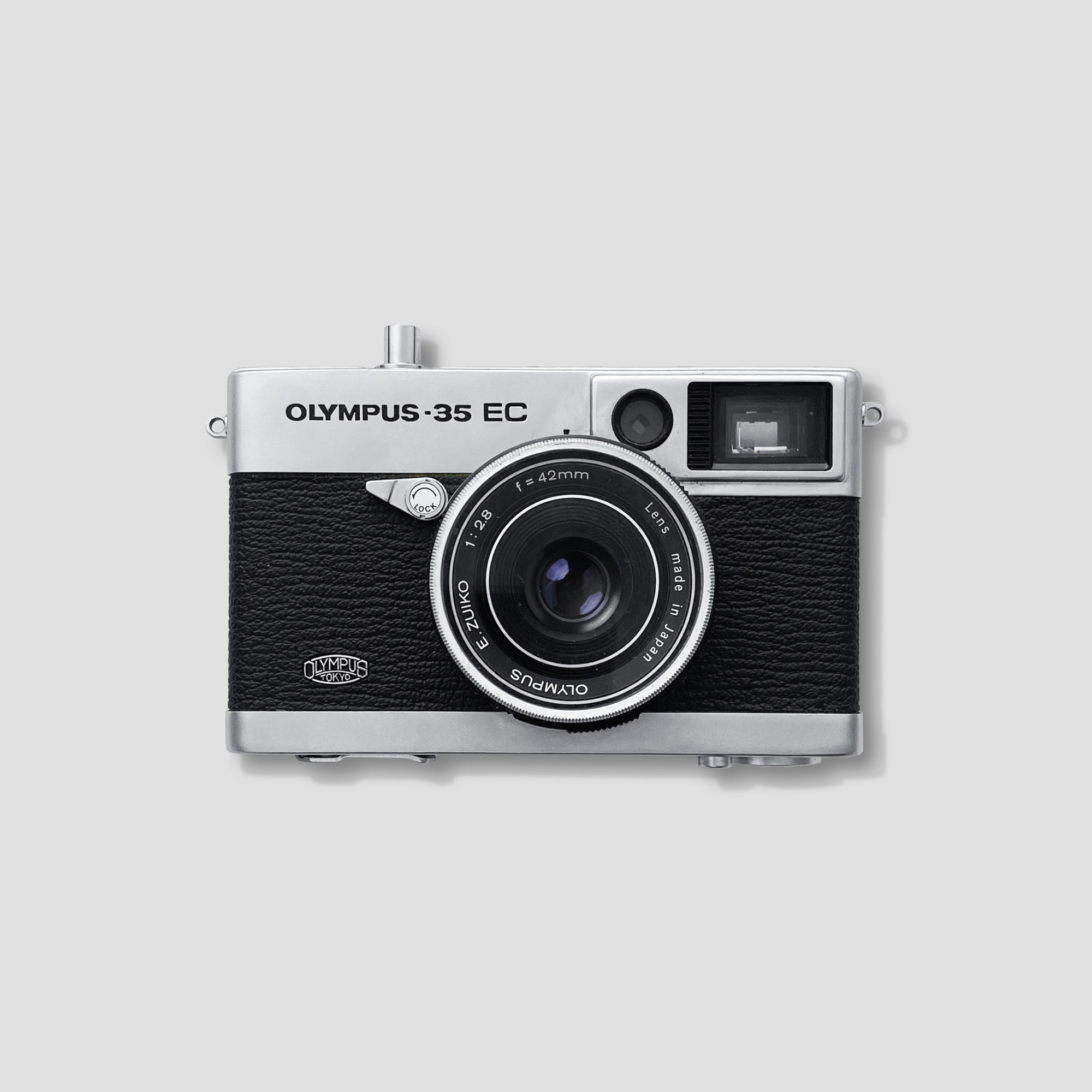 Olympus 35 EC rangefinder camera close-up showing the lens and viewfinder