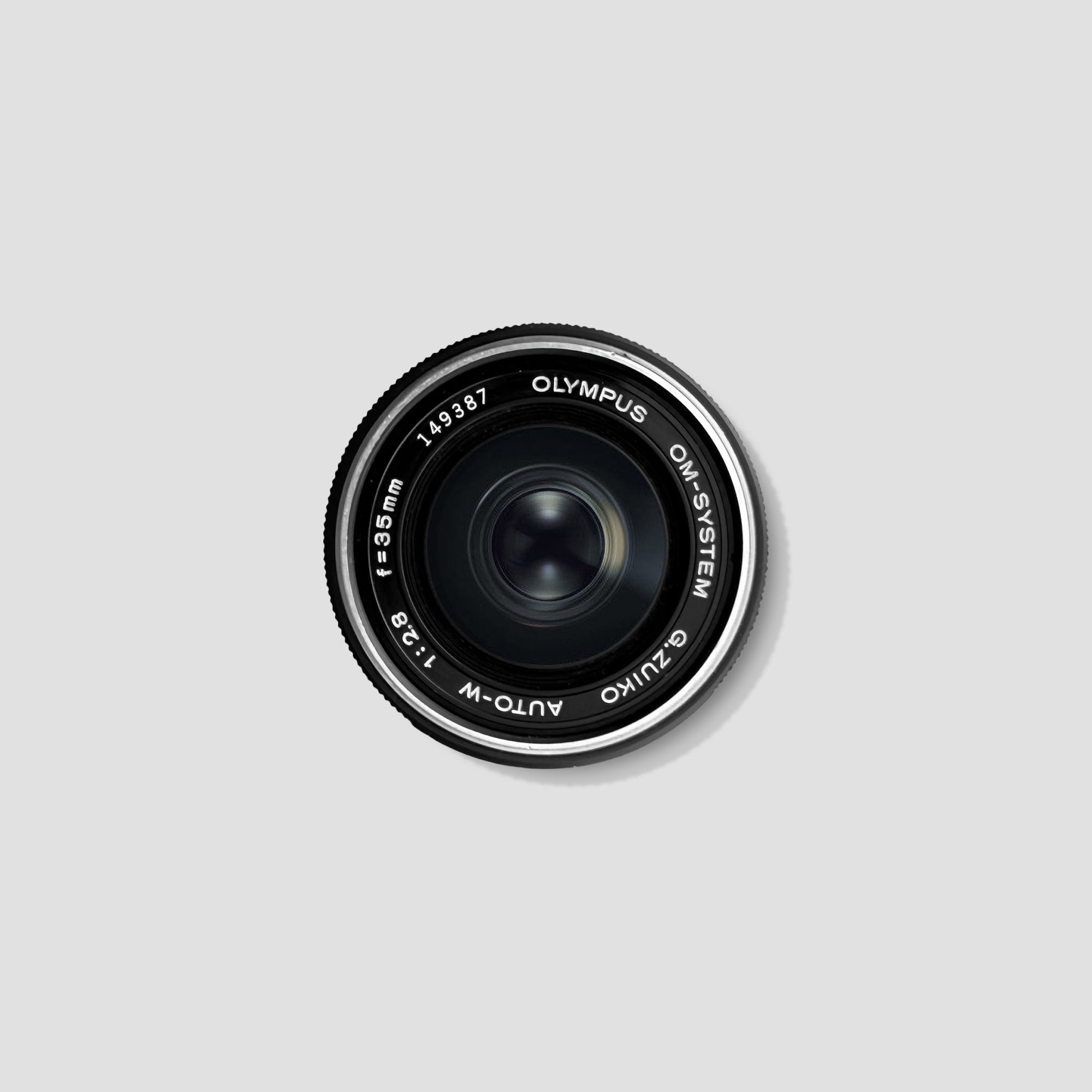 Close-up of the lens mount and focusing ring of the Olympus OM 35mm f/2.8 lens