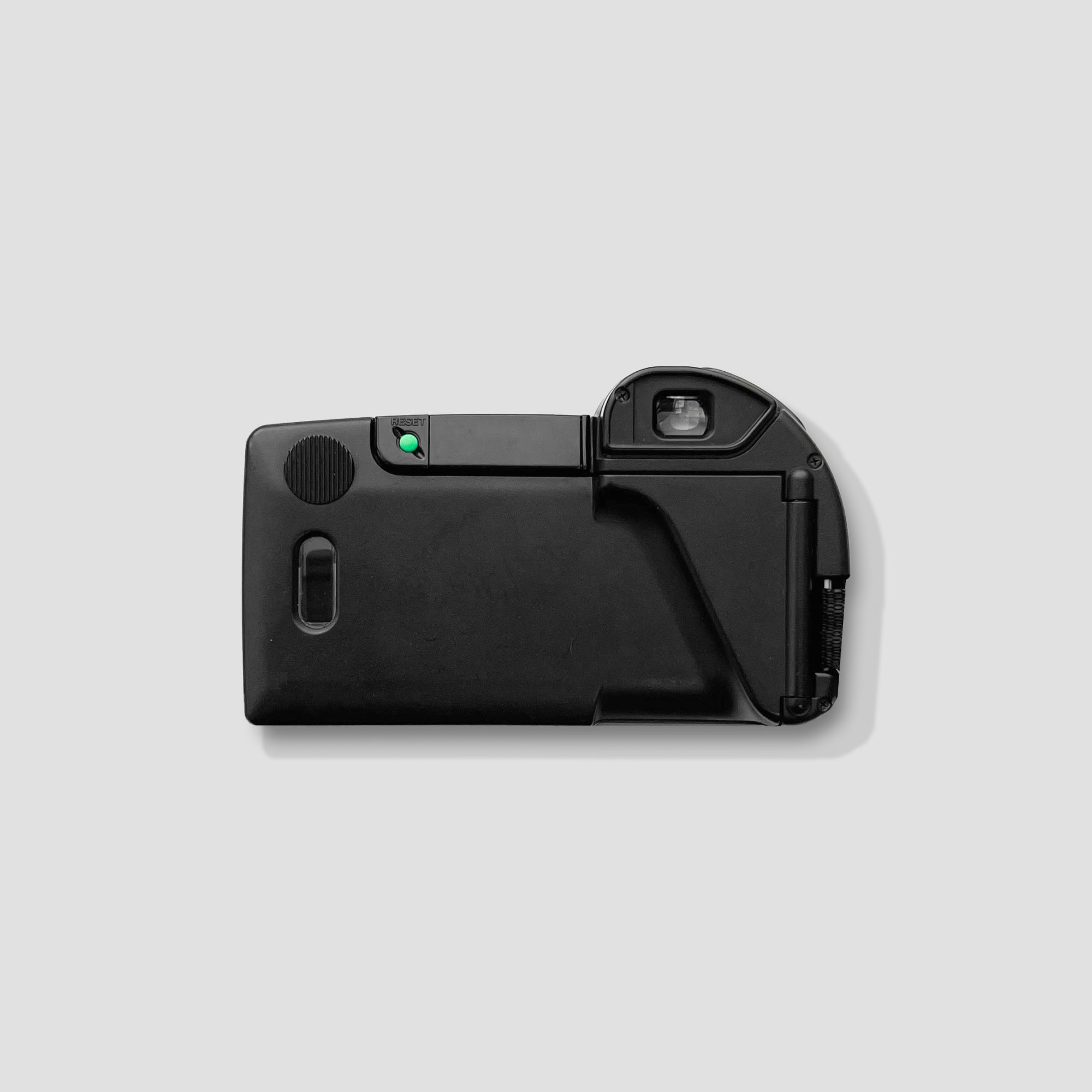 Detailed view of the Olympus AZ-300 Superzoom showing its compact design and built-in flash features.