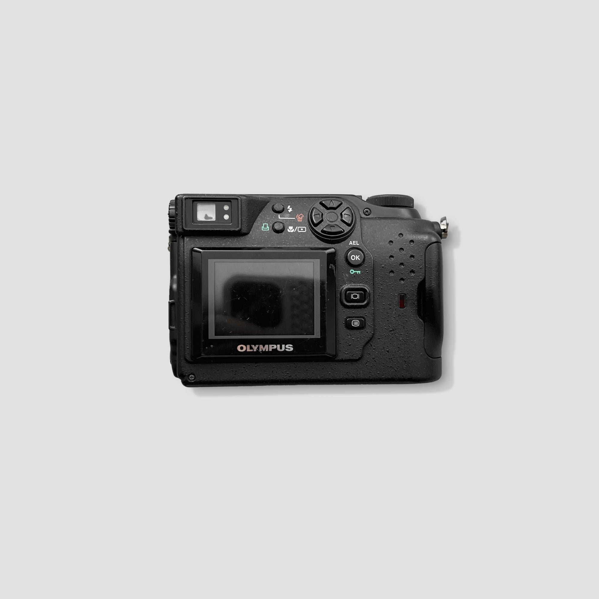 Close-up of Olympus Camedia C-3040s lens and controls