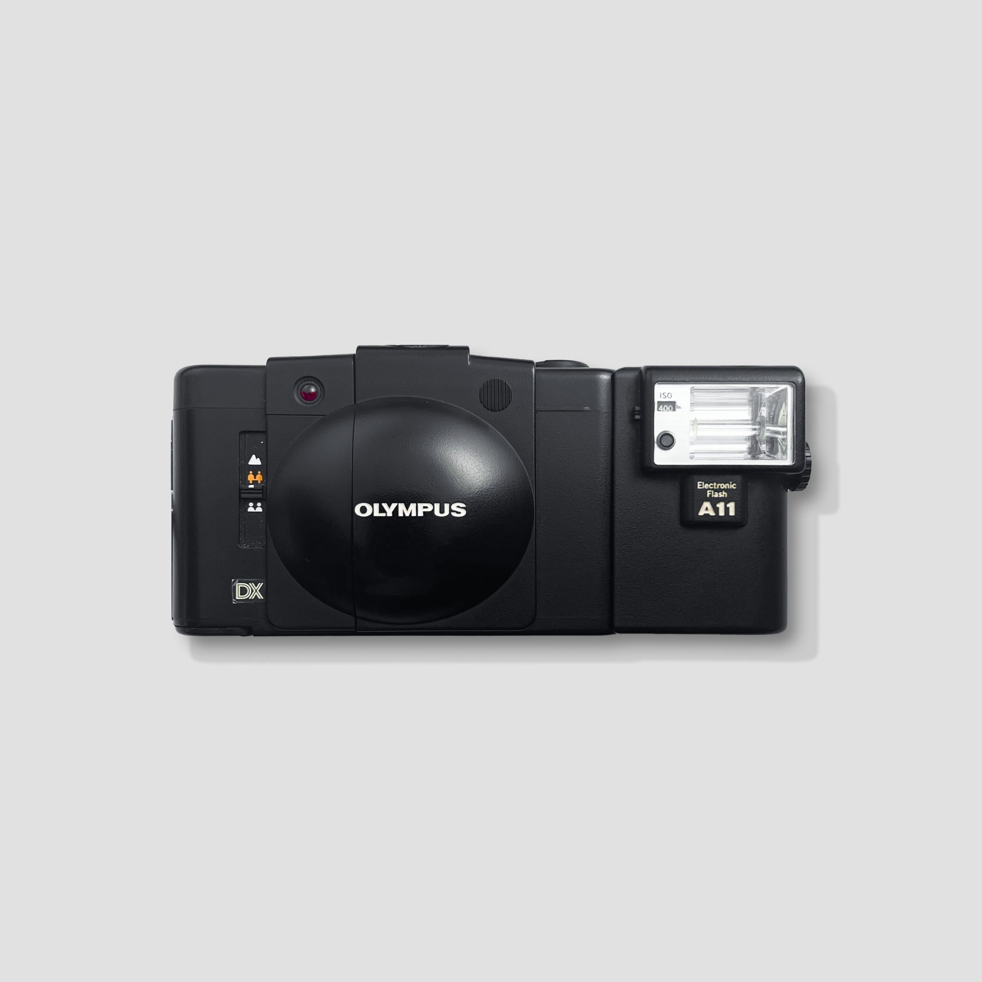 Olympus XA-3 35mm film camera showing front view with lens and flash