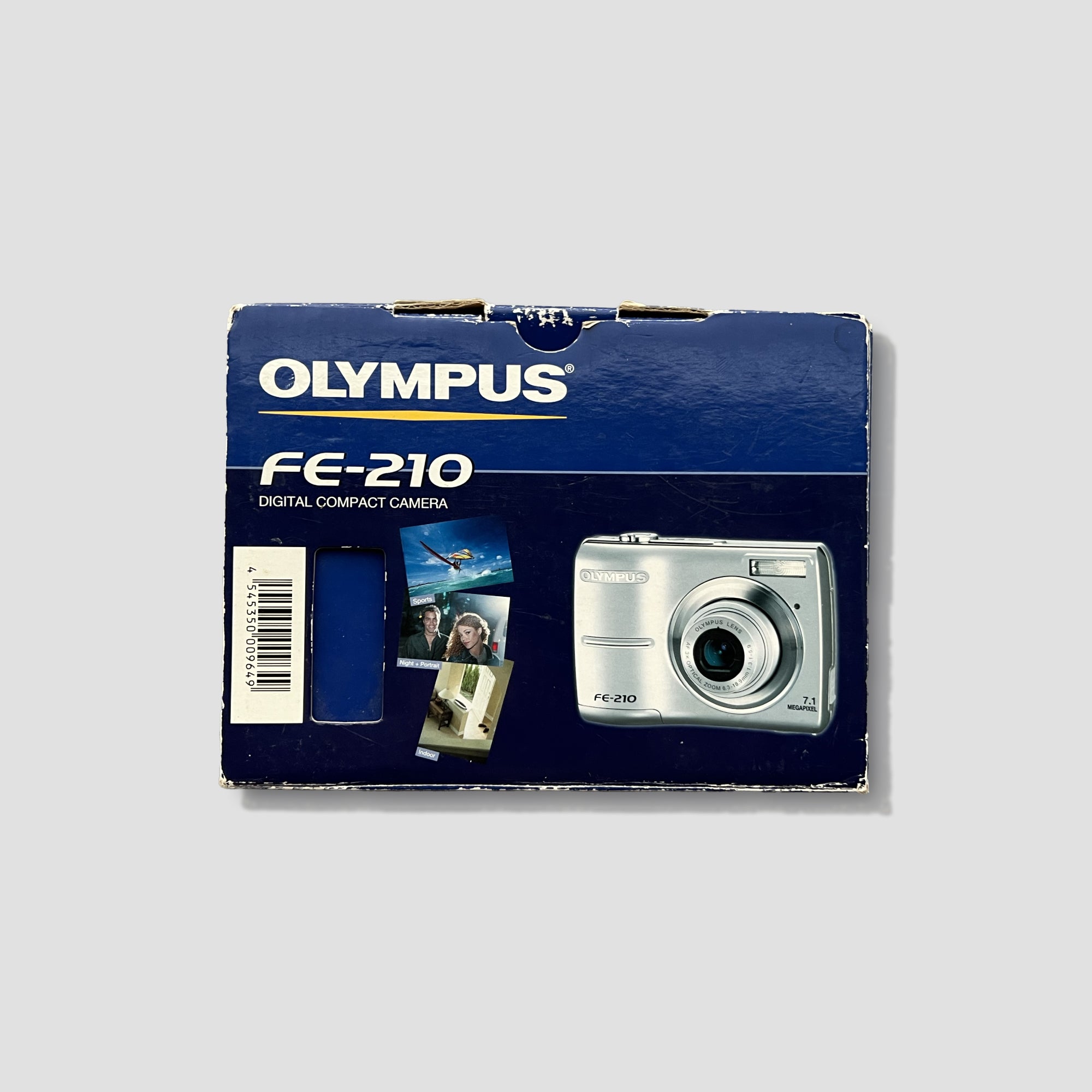 Front view of Olympus FE-210 compact digital camera highlighting its design and controls