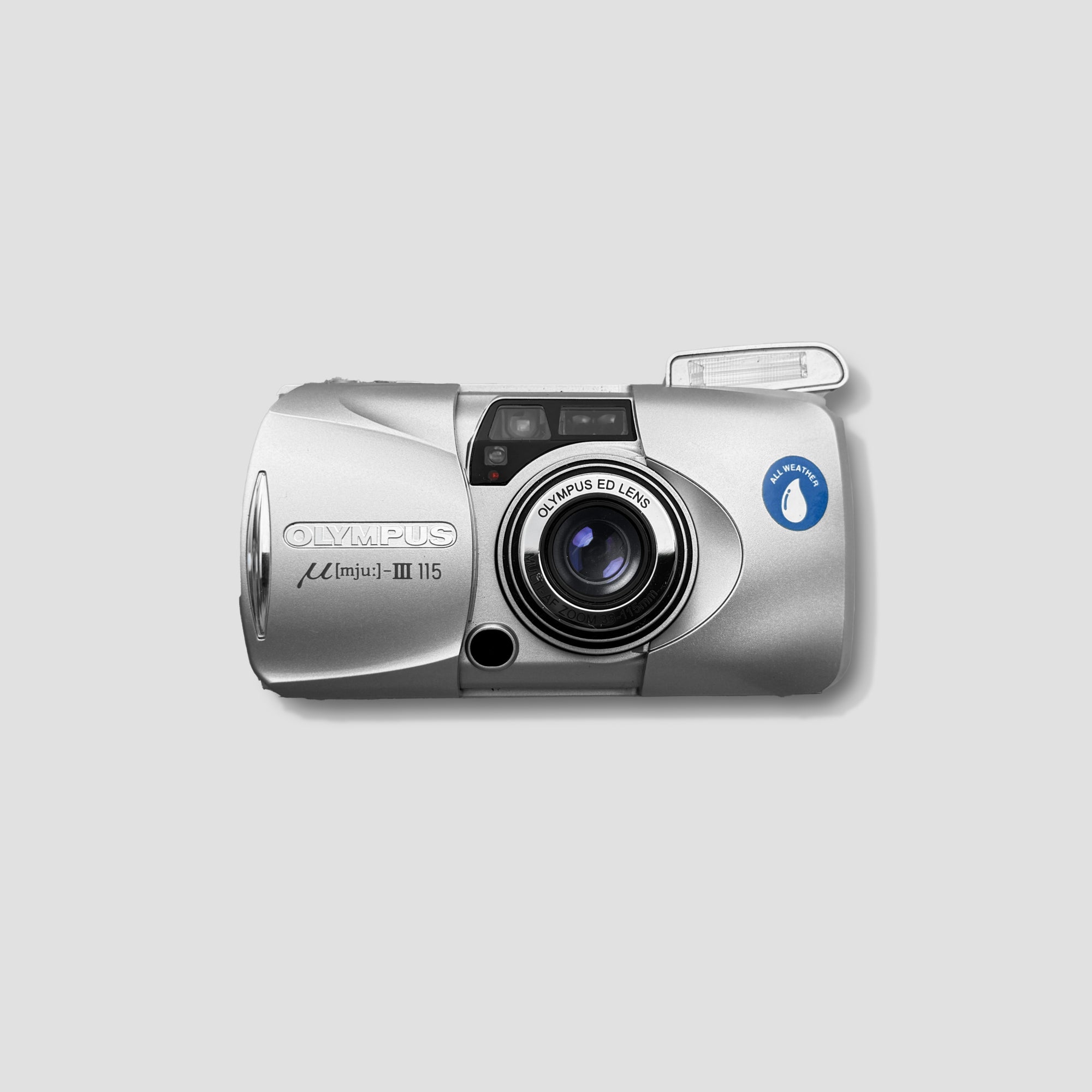 Olympus Mju III 115 camera showcasing its sleek design and weatherproof features.