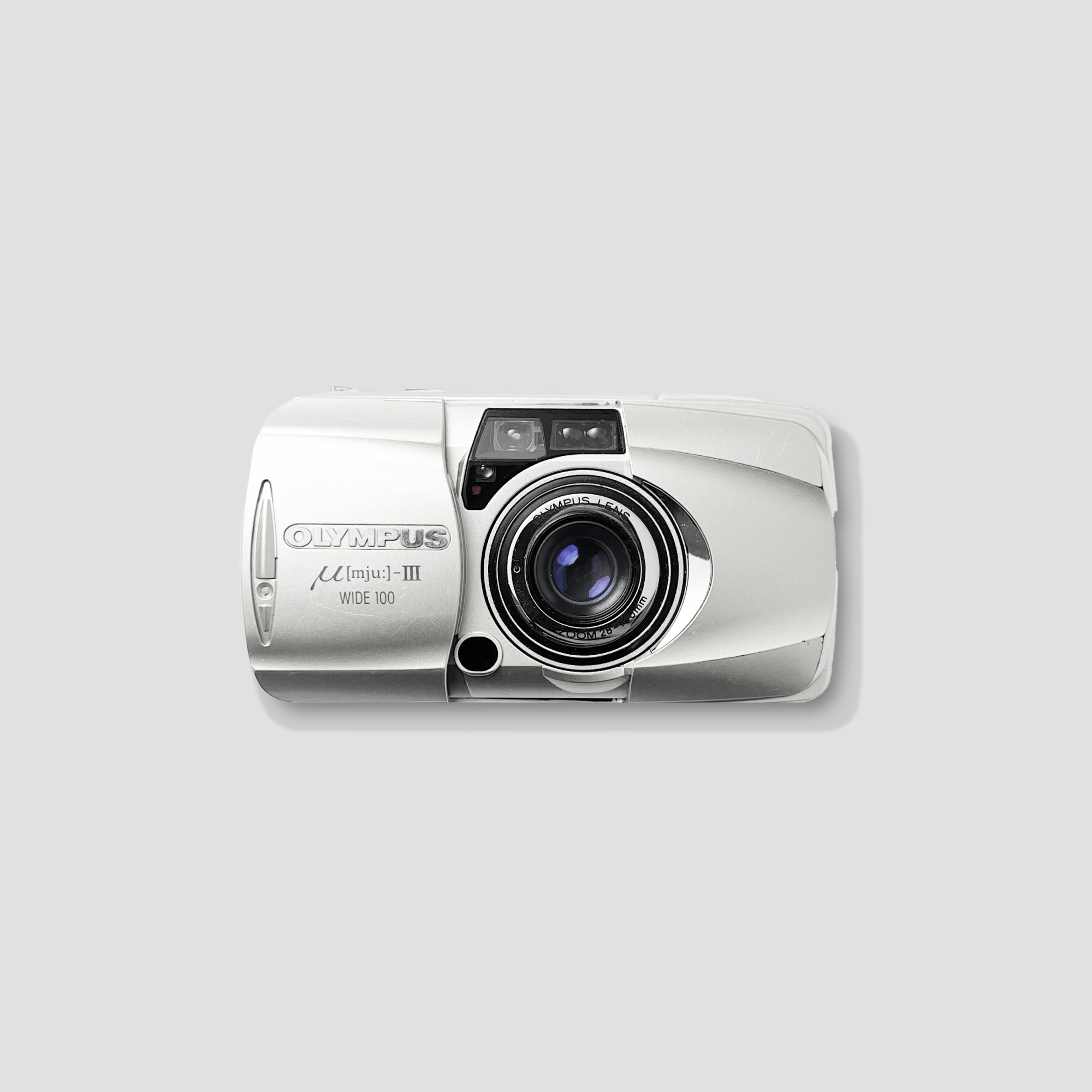 Olympus MJU III Wide 100 film camera showcasing its compact design and wide-angle lens ideal for scenic photography.